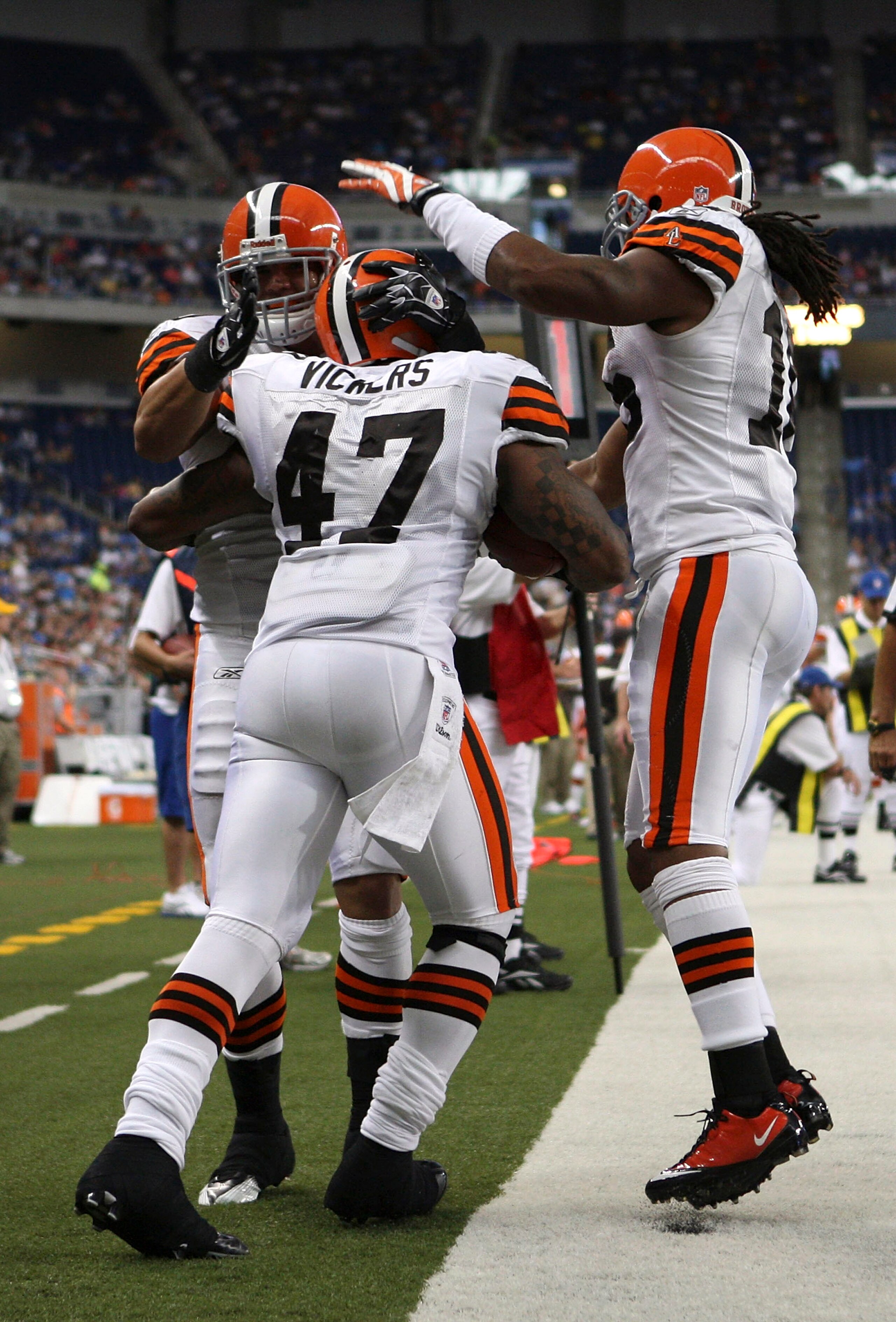 DETROIT - AUGUST 28:  Lawrence Vickers #47 of the Cleveland Browns scores a second quarter touchdown and is congratulated by his teammates during the preseason game against the Detroit Lions at Ford Field on August 28, 2010 in Detroit, Michigan.  (Photo b