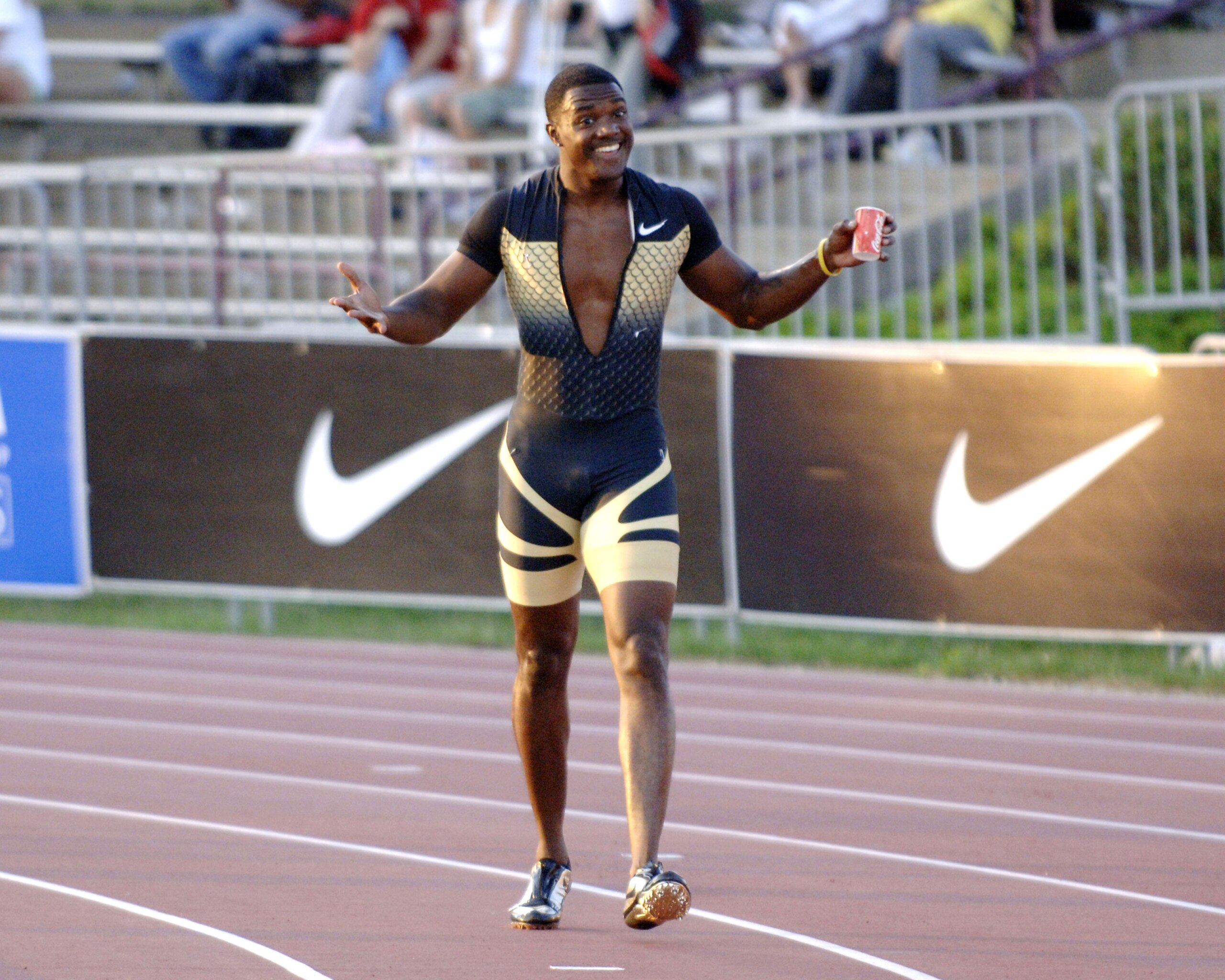 World record holder Justin Gatlin wins the men's 100-meter dash June 23 at the 2006 AT&T Outdoor Track and Field Championships in Indianapolis. (Photo by A. Messerschmidt/Getty Images) World record holder Justin Gatlin wins the men's 100-meter dash June 23 at the 2006 AT&T Outdoor Track and Field Championships in Indianapolis. (Photo by A. Messerschmidt/Getty Images)