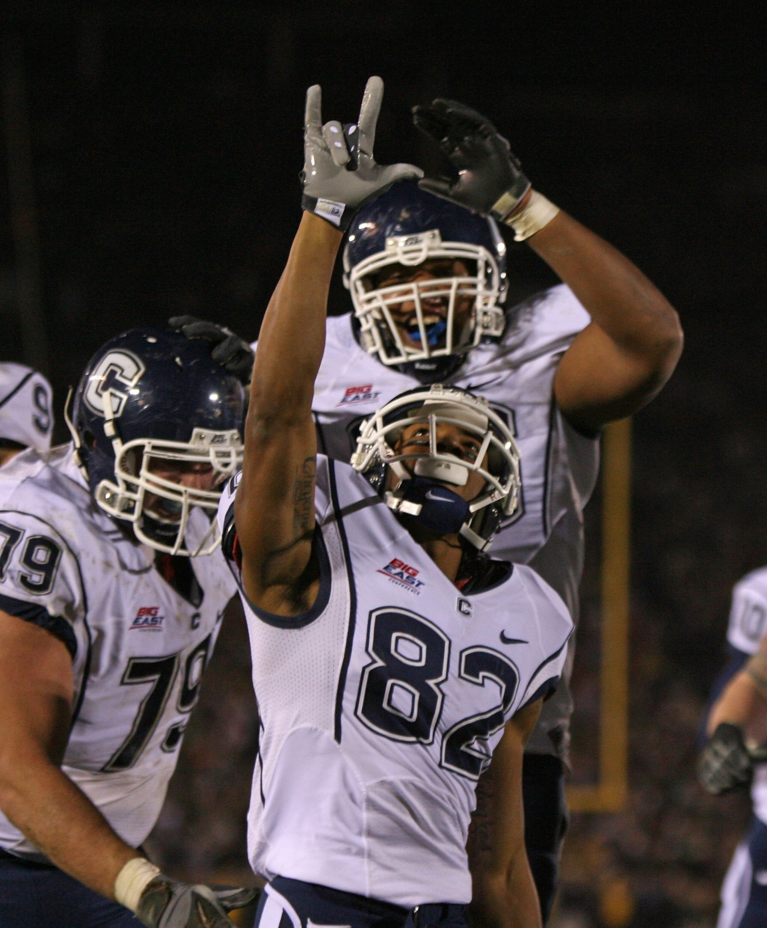 SOUTH BEND, IN - NOVEMBER 21: Kashif Moore #82 of the Univeristy of Connecticut Huskies celebrates an overtime touchdown catch against the Notre Dame Fighting Irish at Notre Dame Stadium on November 21, 2009 in South Bend, Indiana. Connecticut defeated No