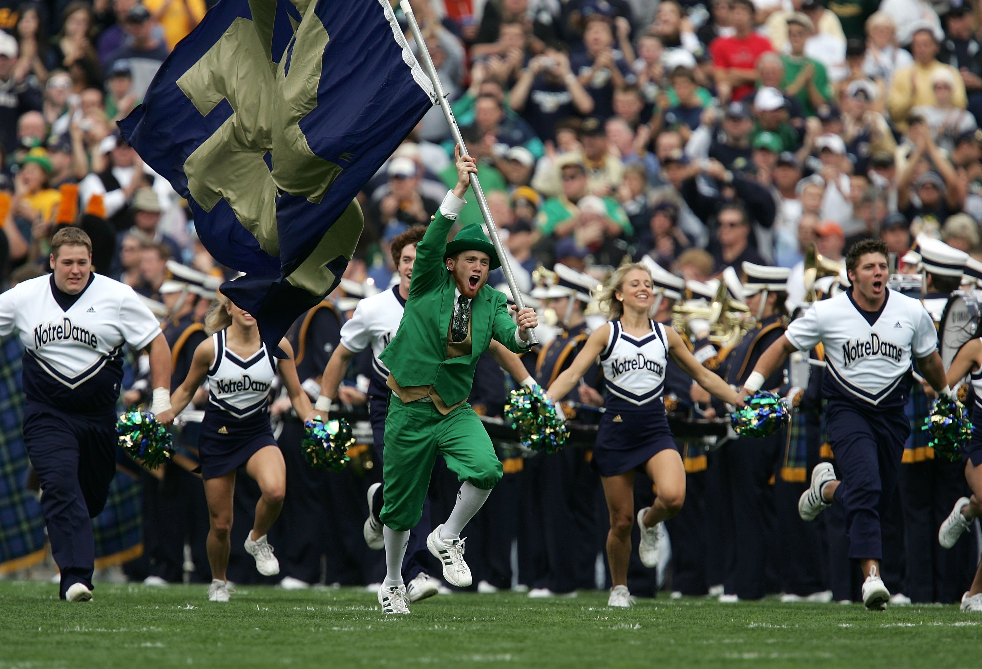 SOUTH BEND, IN - SEPTEMBER 30:  The Leprechaun, masscot for the Notre Dame Fighting Irish charges onto the field with the ND cheerleaders against the Purdue Boilermakers September 30, 2006 at Notre Dame Stadium in South Bend, Indiana. Notre Dame won 35-21
