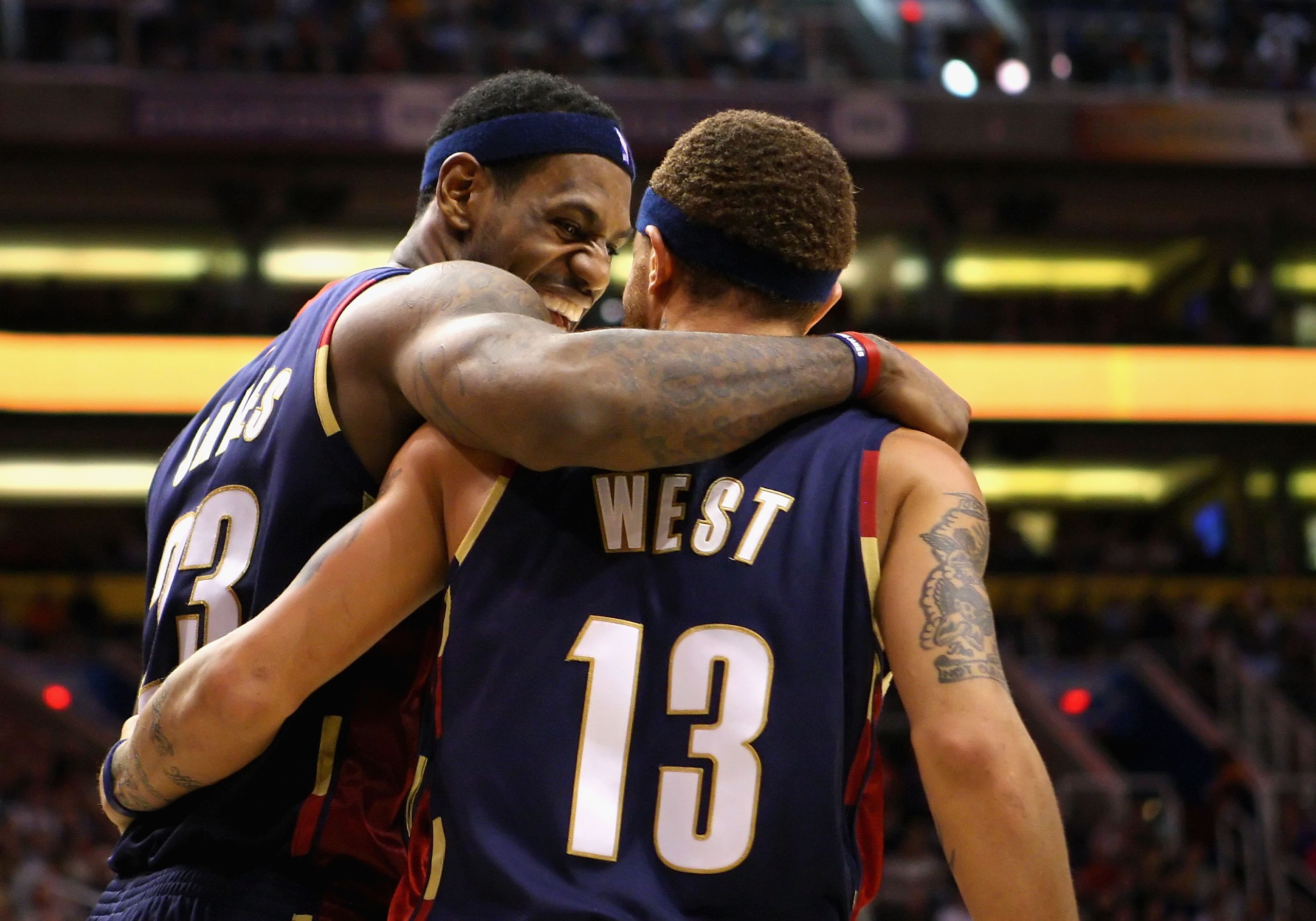 PHOENIX - DECEMBER 21:  LeBron James #23 of the Cleveland Cavaliers celebrates with teammate Delonte West #13 after a three point play against the Phoenix Suns during the NBA game at US Airways Center on December 21, 2009 in Phoenix, Arizona. The Cavalier