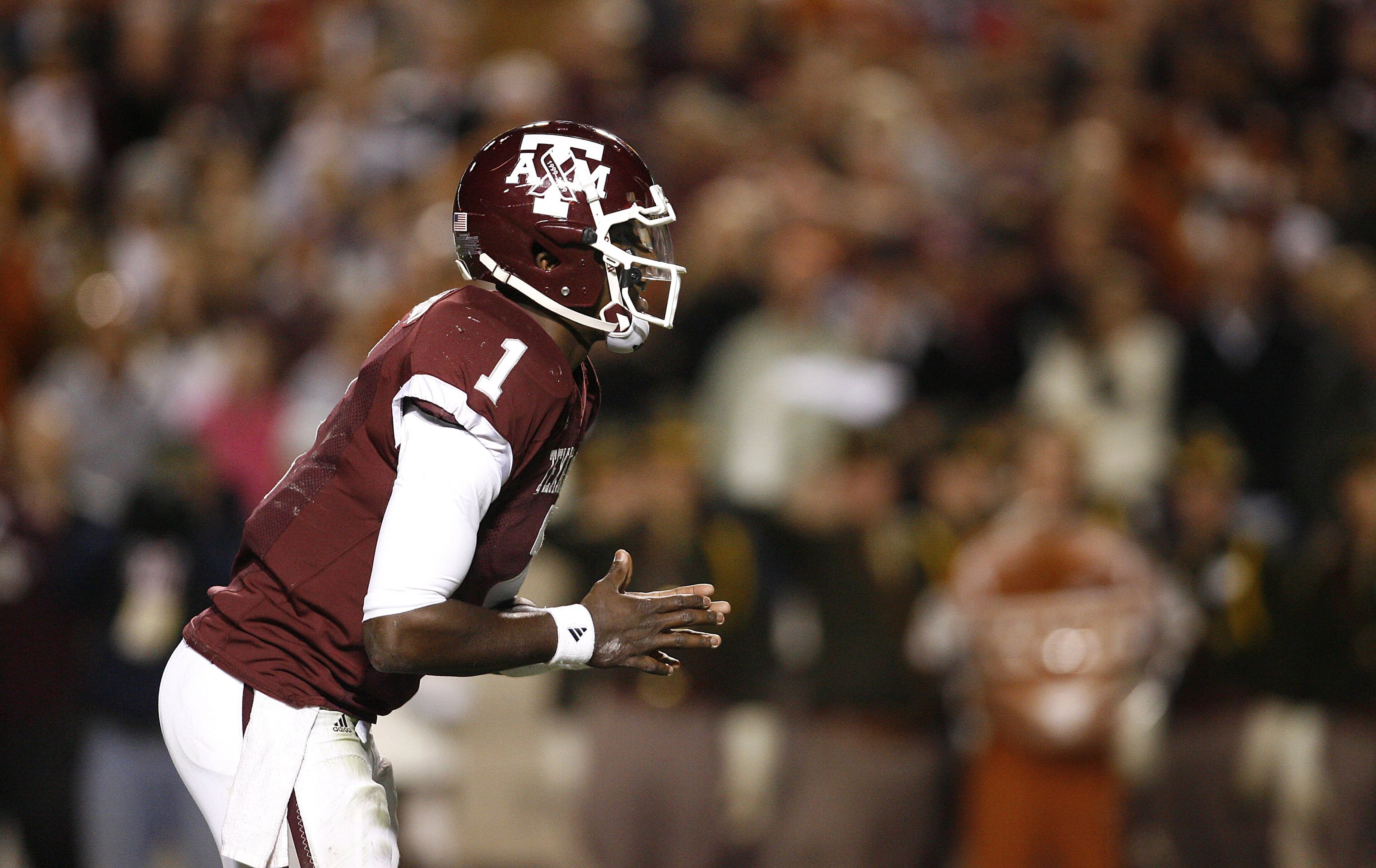 COLLEGE STATION, TX - NOVEMBER 26: Quarterback Jerrod Johnson #1 of the Texas A&M Aggies against the Texas Longhorns in the second half at Kyle Field on November 26, 2009 in College Station, Texas. The Longhorns defeated the Aggies 49-39 (Photo by Aaron M