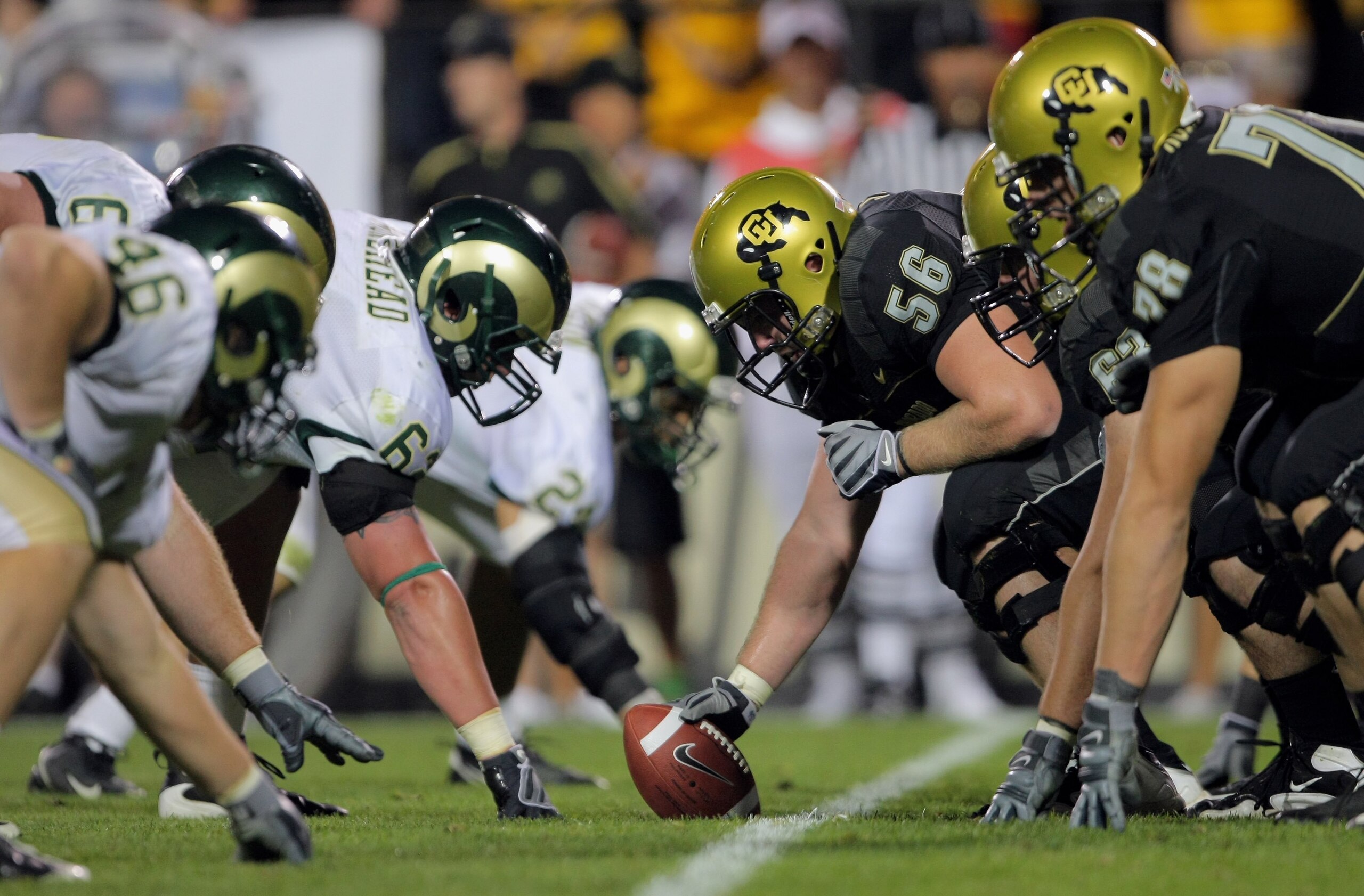 BOULDER, CO - SEPTEMBER 06:  Center Keenan Stevens #56 of the Colorado Buffaloes prepares to snap the ball on the line of scrimmage against the Colorado State Rams at Folsom Field on September 6, 2009 in Boulder, Colorado. The Rams defeated the Buffaloes