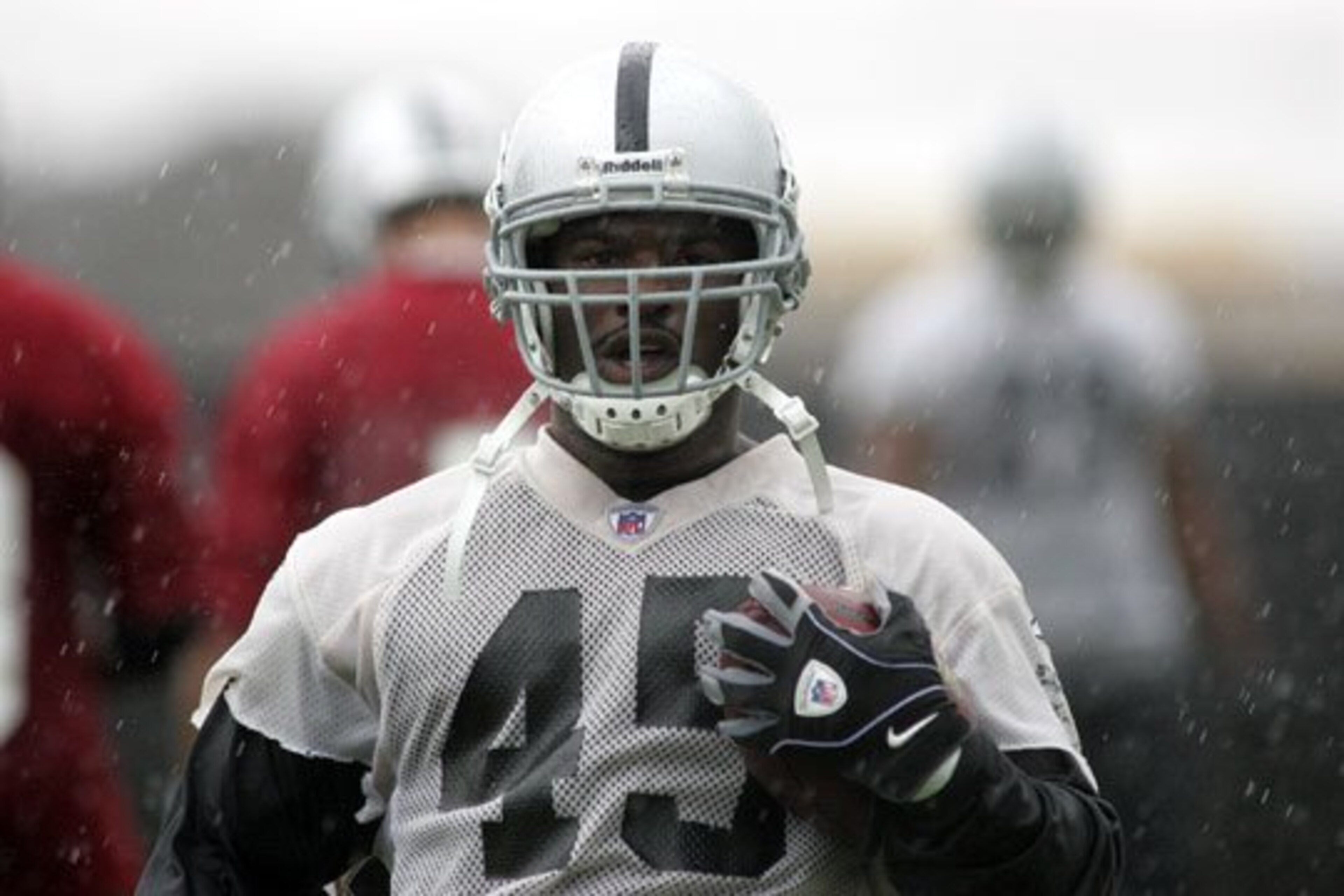 Fullback Marcel Reece working hard in the rain.