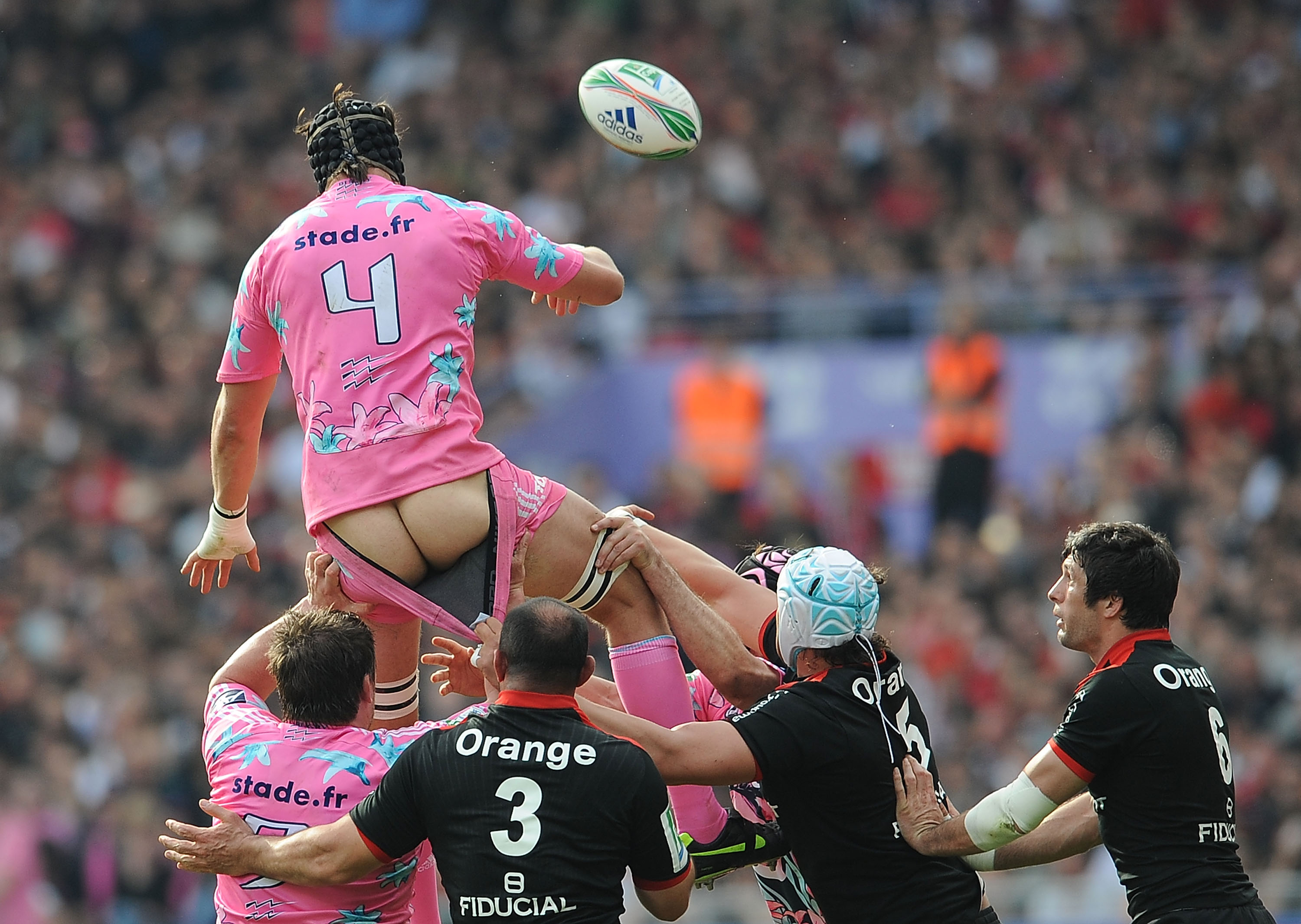TOULOUSE, FRANCE - APRIL 11:  Tom Palmer of Stade Francais has pants shorts pulled during the line out during the Heineken Cup Quarter Final match between Stade Toulousain and Stade Francais at the Stade Municipal on April 11, 2010 in Toulouse, France.  (
