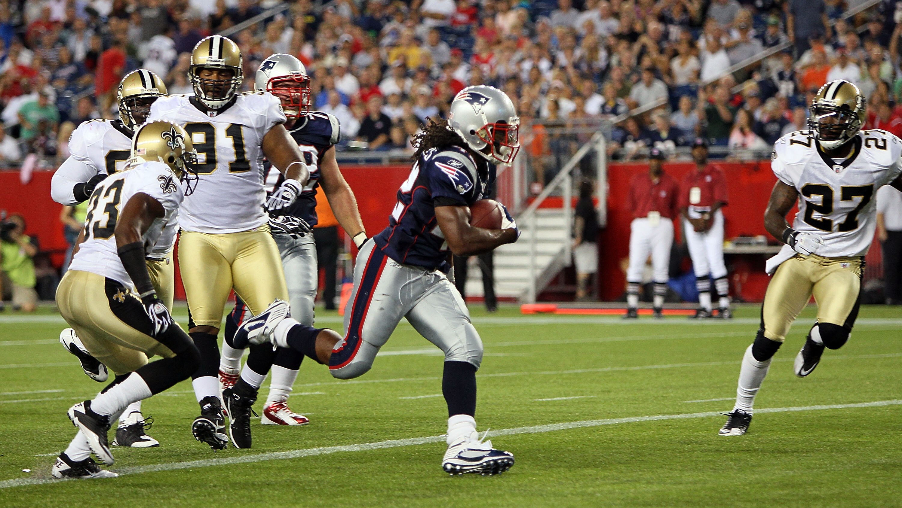 FOXBORO, MA - AUGUST 12: BenJarvus Green-Ellis #42 of the New England Patriots scores a touchdown during the first quarter of a preseason game against the New Orleans Saints at Gillette Stadium on August 12, 2010 in Foxboro, Massachusetts. (Photo by Jim R
