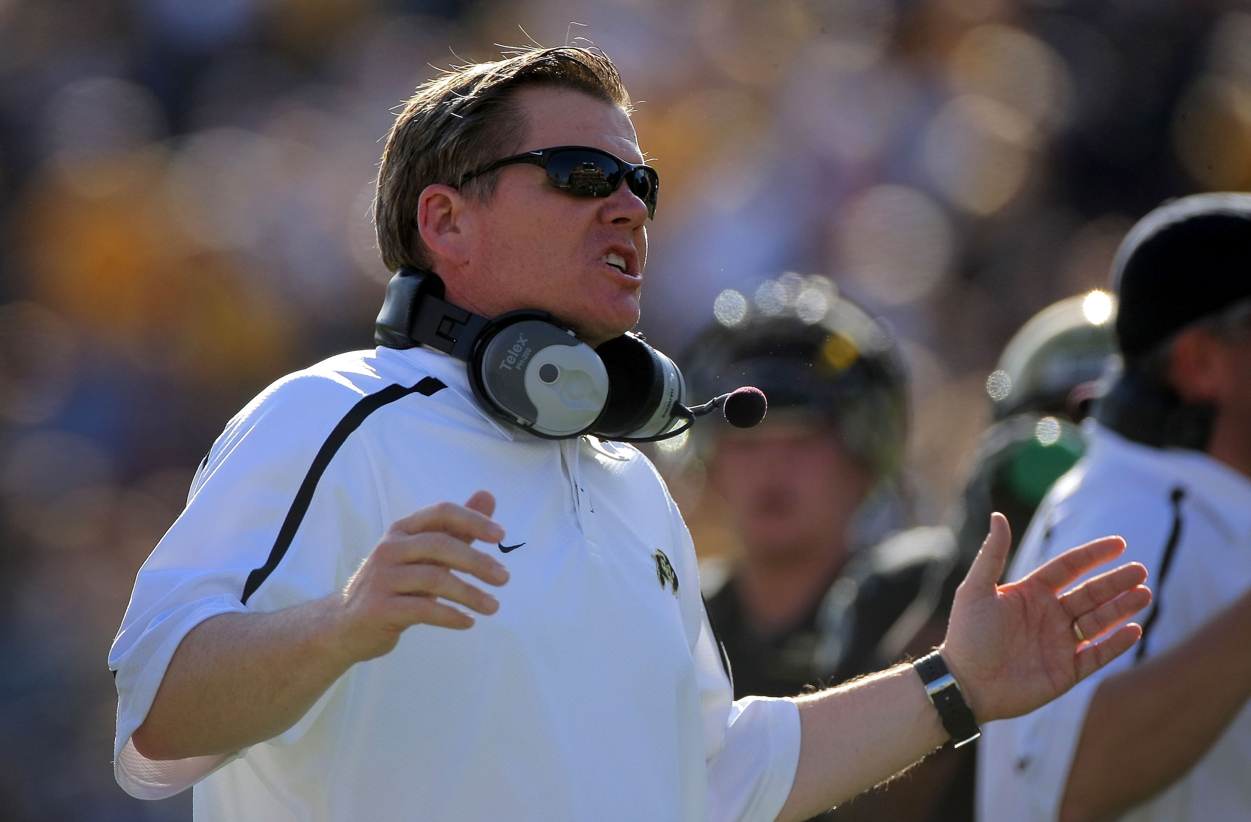 BOULDER, CO - NOVEMBER 07:  Head coach Dan Hawkins leads the Colorado Buffaloes against the Texas A&M Aggies during NCAA college football action at Folsom Field on November 7, 2009 in Boulder, Colorado. Colorado defeated Texas A&M 35-34.  (Photo by Doug P
