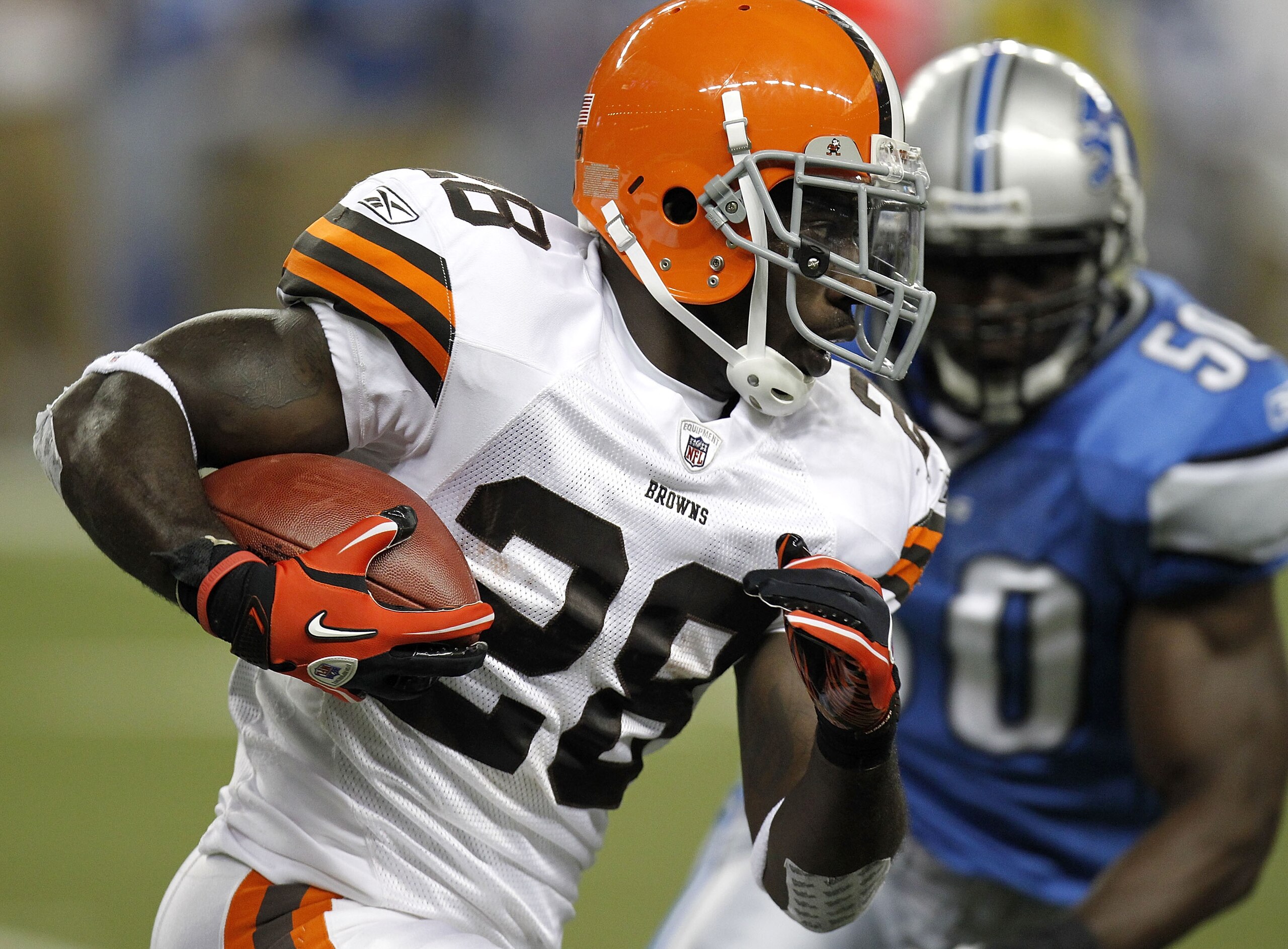 DETROIT - AUGUST 28:  James Davis #28  of the Cleveland Browns tries to get around the tackle of Isaiah Ekejiuba #50 of the Detroit Lions during a preseason game on August 28, 2010 at Ford Field in Detroit, Michigan.  (Photo by Gregory Shamus/Getty Images