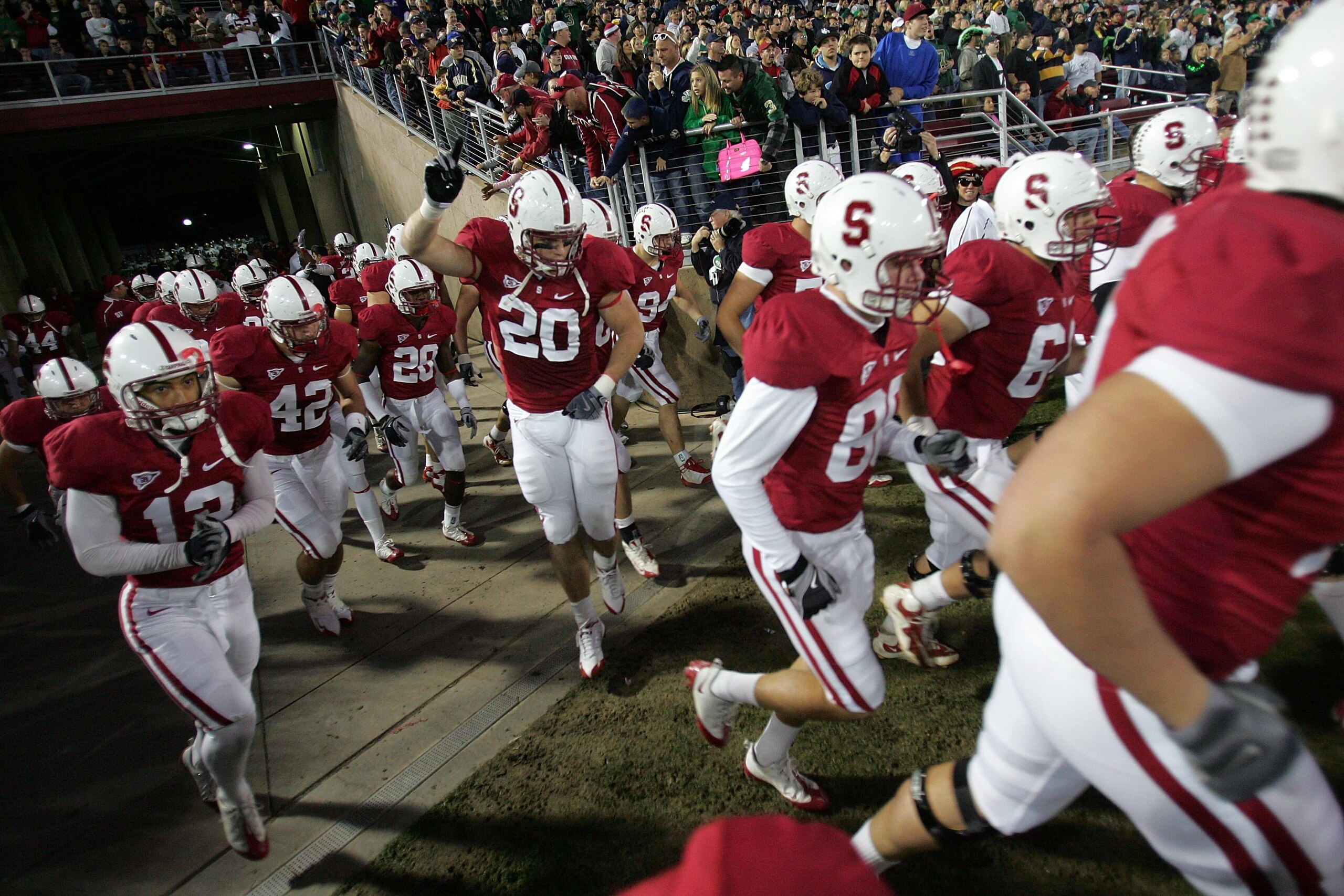 PALO ALTO, CA - NOVEMBER 28:  Clinton Snyder #20 and the rest of the Stanford Cardinal run out of the tunnel for their game against the Notre Dame Fighting Irish at Stanford Stadium on November 28, 2009 in Palo Alto, California.  (Photo by Ezra Shaw/Getty
