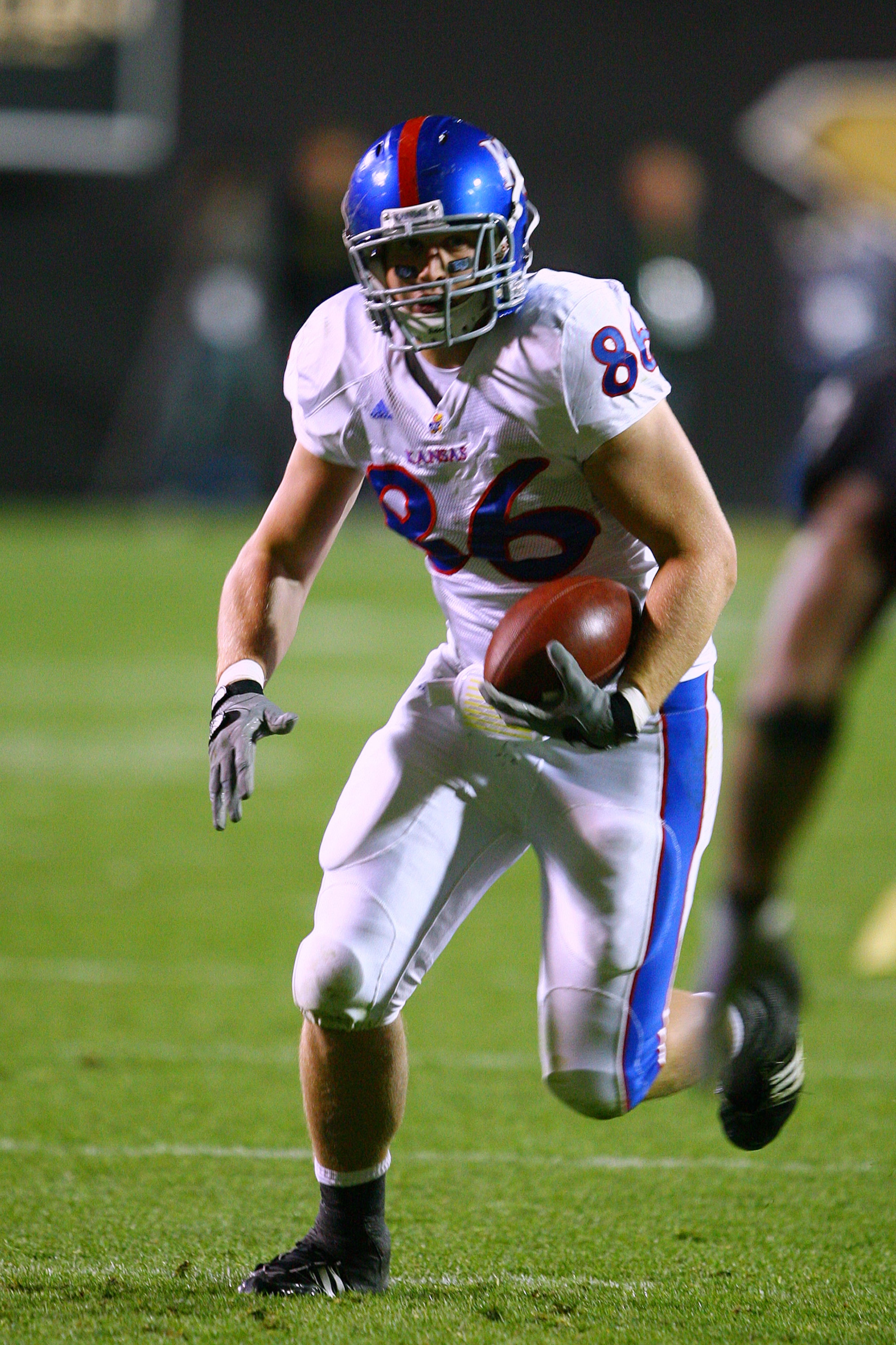 BOULDER, CO - OCTOBER 17: Tim Biere #86 of the Kansas Jayhawks runs for a first down against the Colorado Buffaloes at Folsom Field on October 17, 2009 in Boulder, Colorado. (Photo by Garrett W. Ellwood/Getty Images)