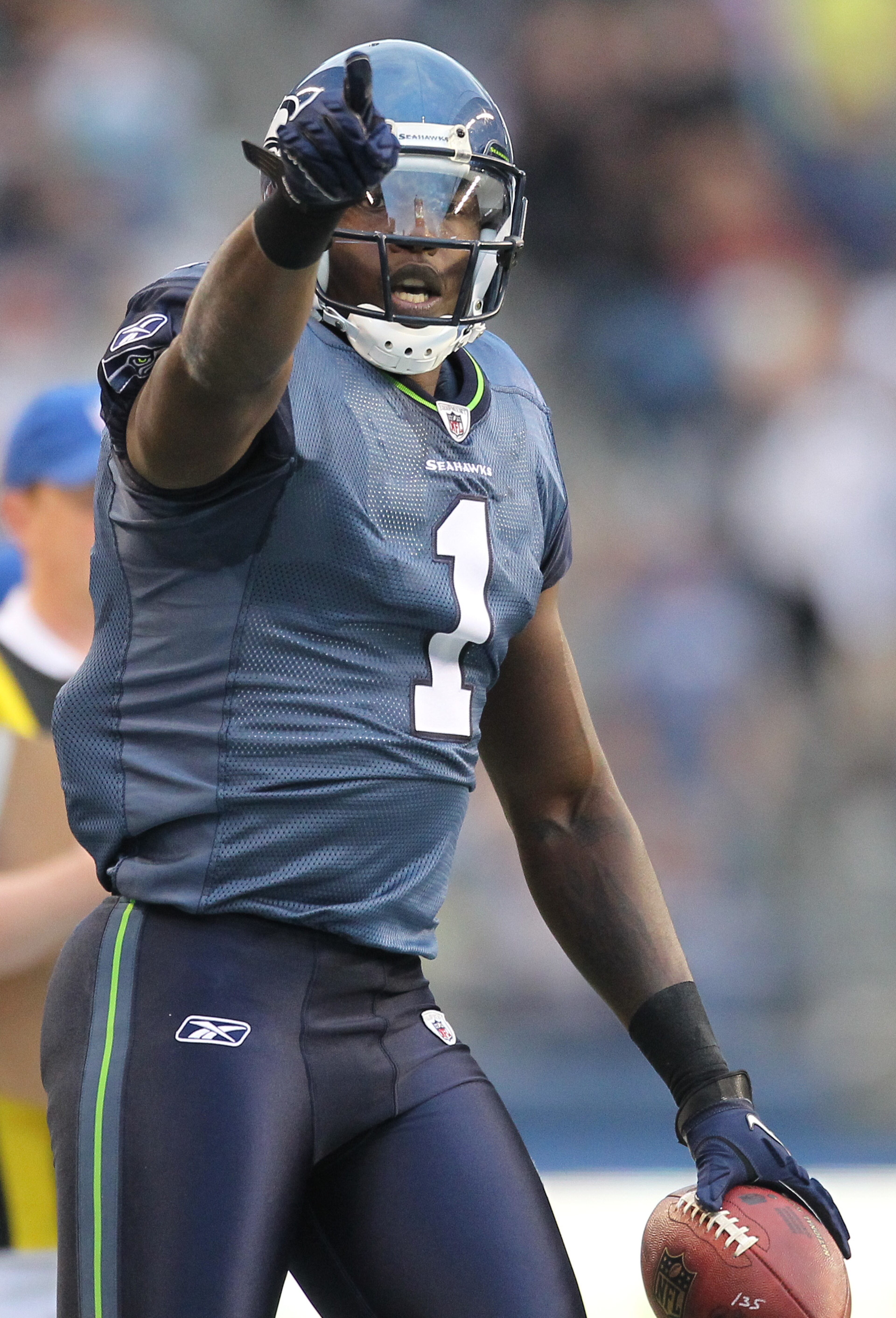 SEATTLE - AUGUST 21:  Wide receiver Mike Williams #1 of the Seattle Seahawks signals first down after making a catch during the preseason game against the Green Bay Packers at Qwest Field on August 21, 2010 in Seattle, Washington. (Photo by Otto Greule Jr