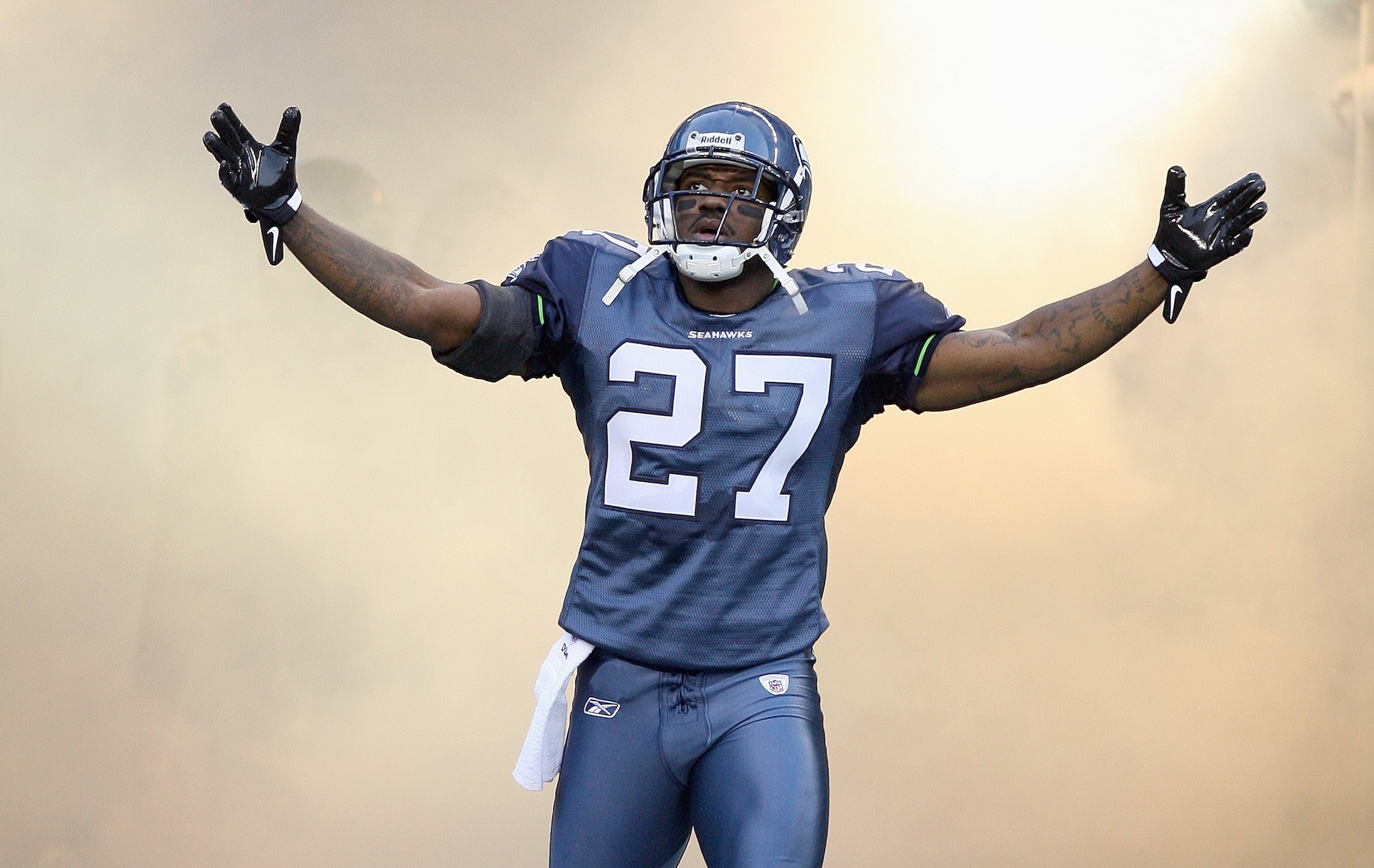 SEATTLE - AUGUST 22: Jordan Babineaux #27 of the Seattle Seahawks celebrates as he enters the field before the game against the Denver Broncos on August 22, 2009 at Qwest Field in Seattle, Washington. (Photo by Otto Greule Jr/Getty Images) SEATTLE - AUGUST 22: Jordan Babineaux #27 of the Seattle Seahawks celebrates as he enters the field before the game against the Denver Broncos on August 22, 2009 at Qwest Field in Seattle, Washington. (Photo by Otto Greule Jr/Getty Images)