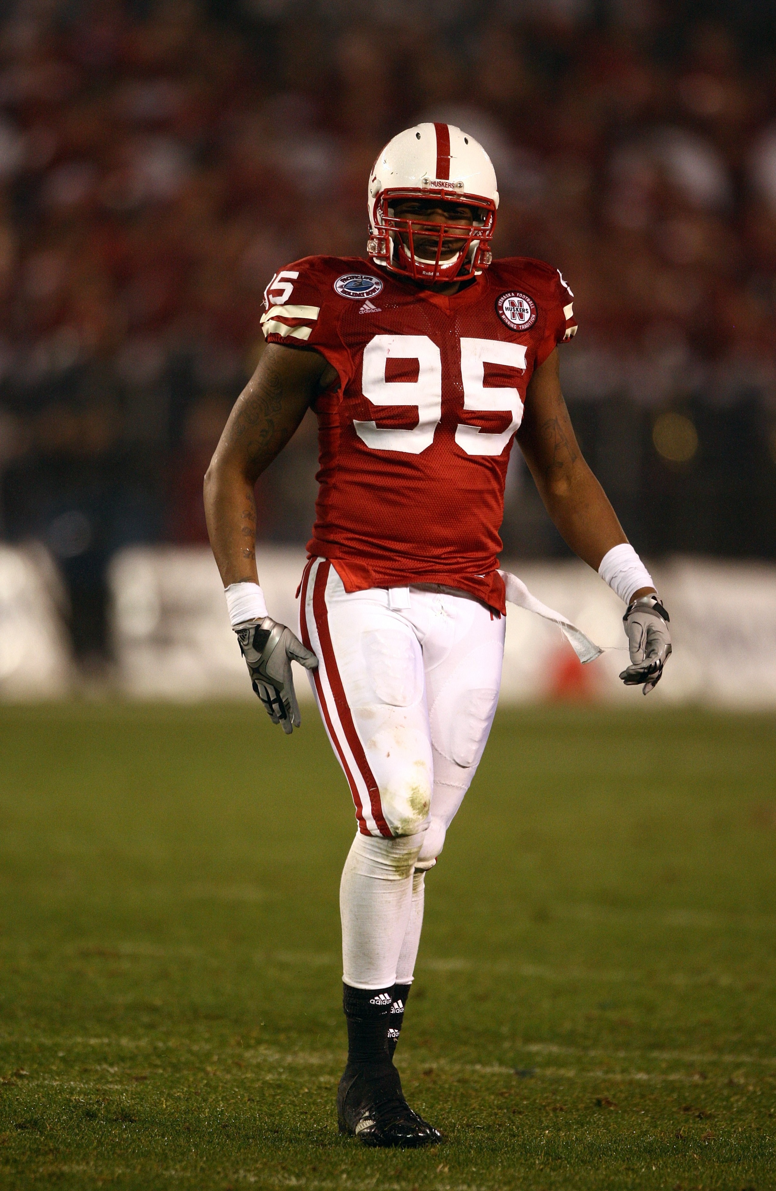 SAN DIEGO - DECEMBER 30:  Pierre Allen #95 of the University of Nebraska Cornhuskers looks on during the Pacific Life Holiday Bowl against University of Arizona Wildcats on December 30, 2009 at Qualcomm Stadium in San Diego, California. The Cornhuskers de