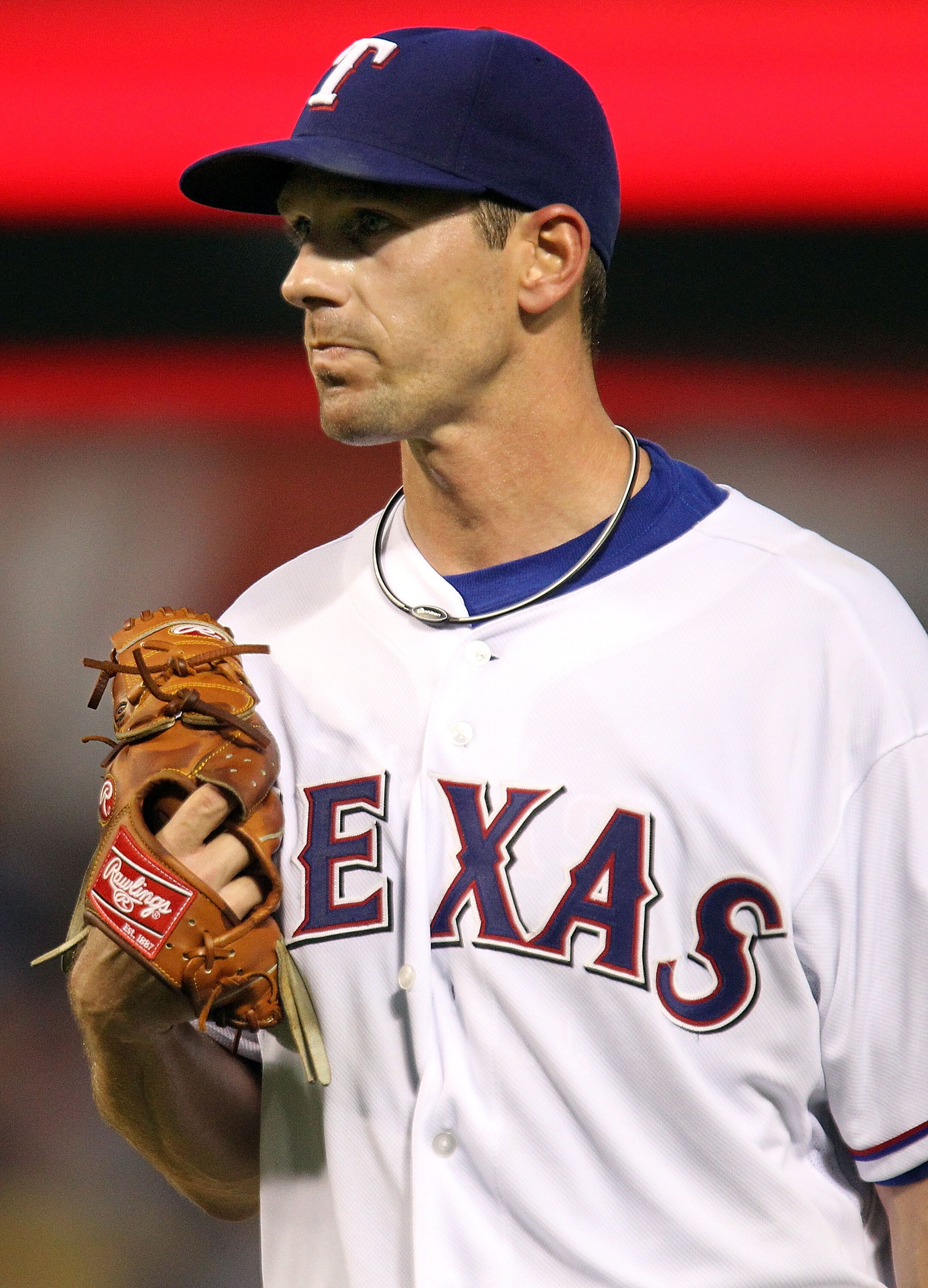 ARLINGTON, TX - JULY 10:  Pitcher Cliff Lee #33 of the Texas Rangers throws against the Baltimore Orioles on July 10, 2010 at Rangers Ballpark in Arlington, Texas.  (Photo by Ronald Martinez/Getty Images)
