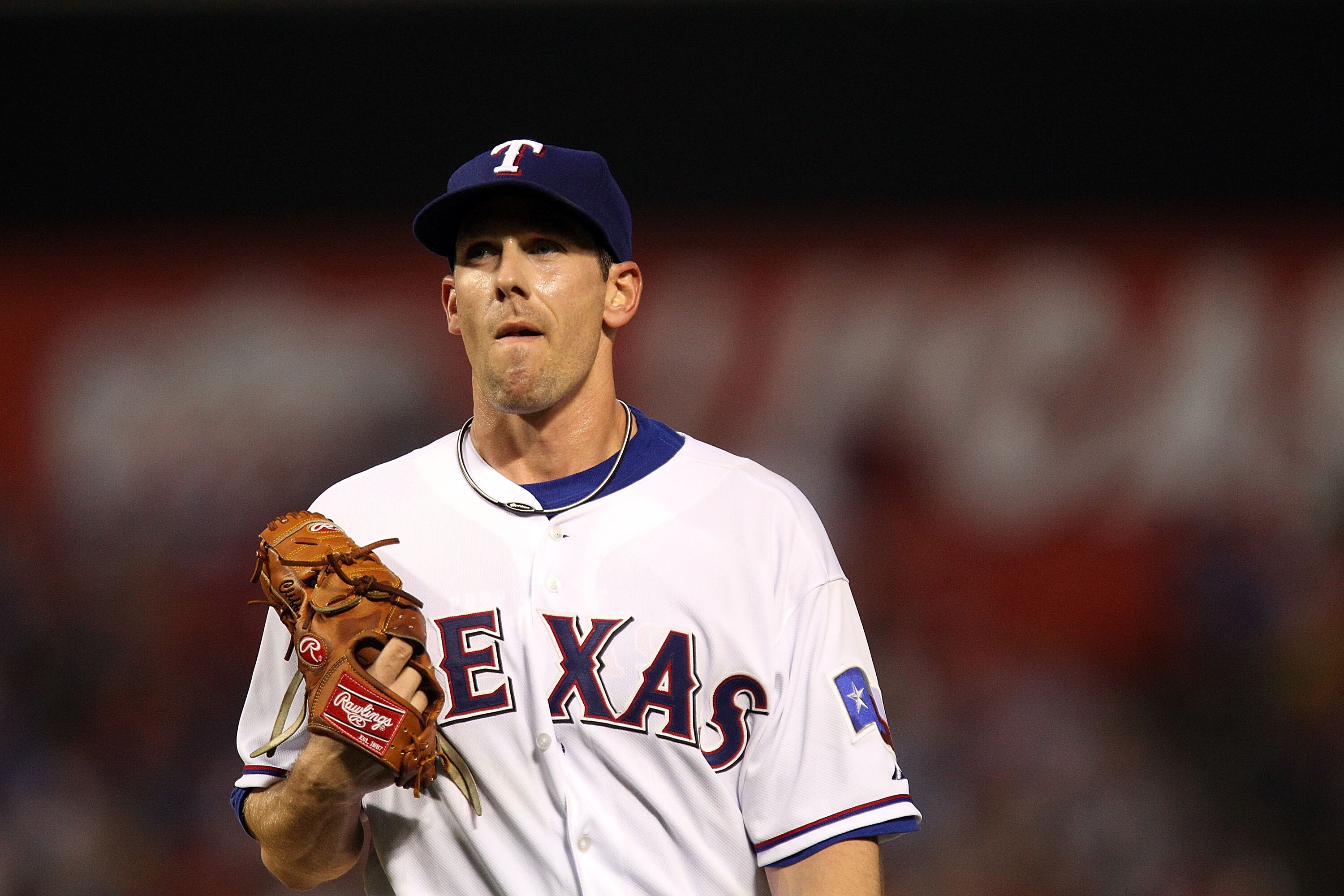 ARLINGTON, TX - JULY 10:  Pitcher Cliff Lee #33 of the Texas Rangers throws against the Baltimore Orioles on July 10, 2010 at Rangers Ballpark in Arlington, Texas.  (Photo by Ronald Martinez/Getty Images)