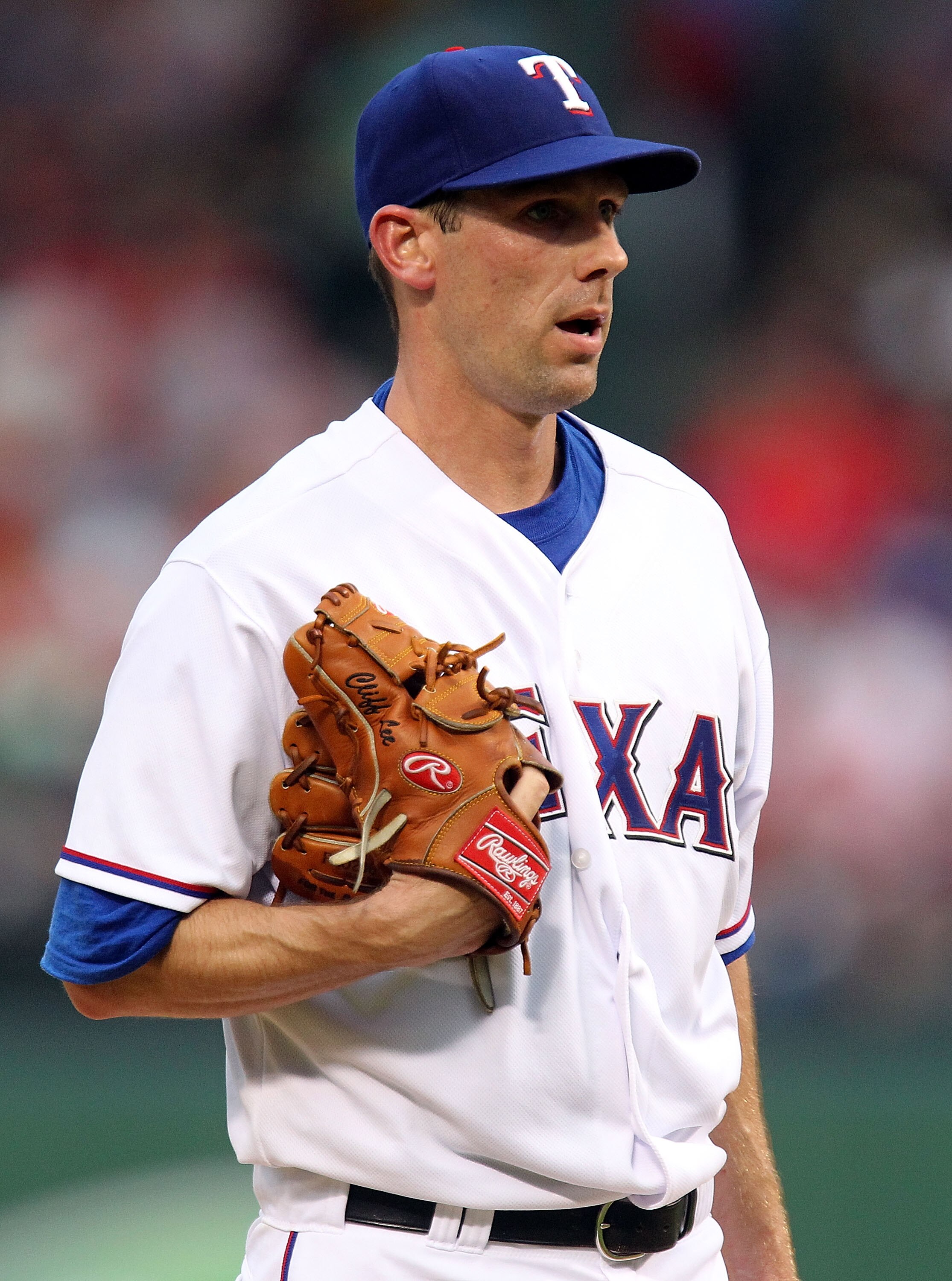 ARLINGTON, TX - JULY 10:  Pitcher Cliff Lee #33 of the Texas Rangers throws against the Baltimore Orioles on July 10, 2010 at Rangers Ballpark in Arlington, Texas.  (Photo by Ronald Martinez/Getty Images)