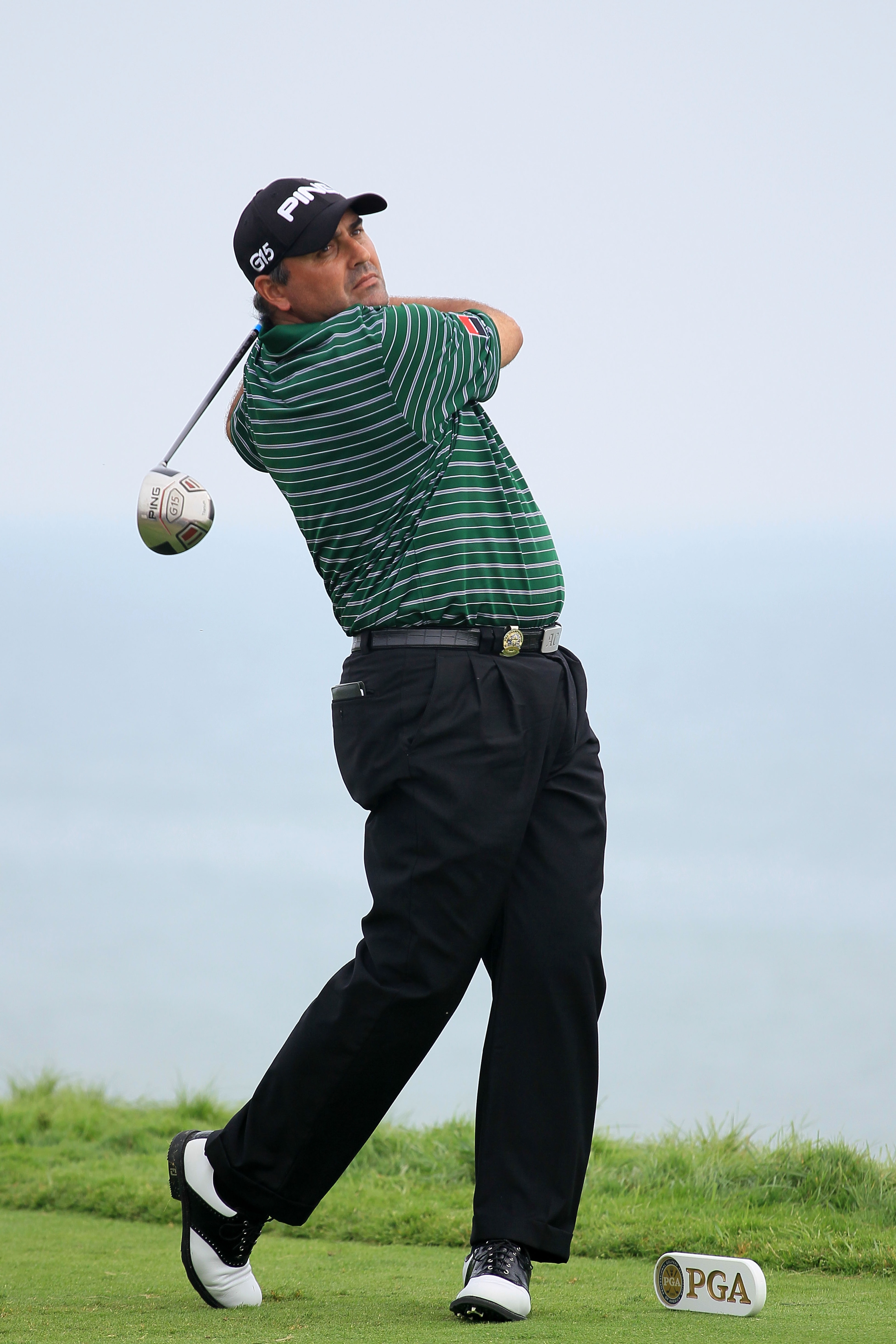 KOHLER, WI - AUGUST 13:  Angel Cabrera of Argentina hits his tee shot on the 16th hole during the continuation of the first round of the 92nd PGA Championship on the Straits Course at Whistling Straits on August 13, 2010 in Kohler, Wisconsin.  (Photo by A