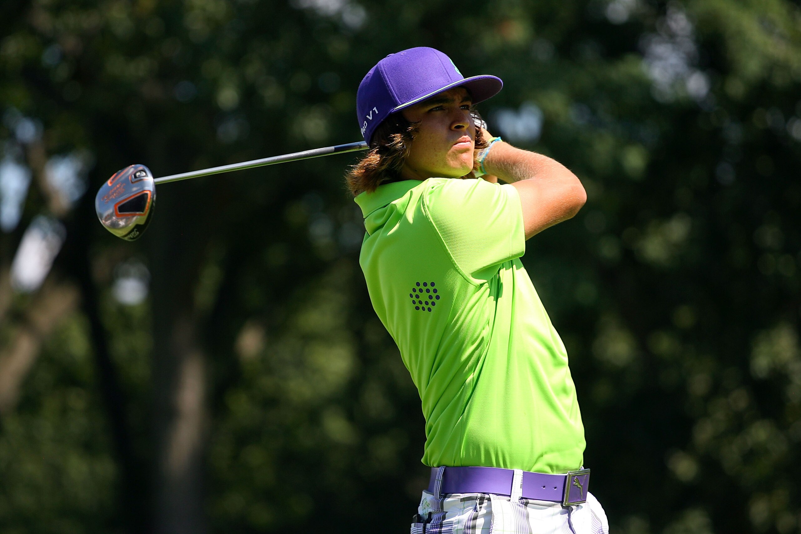 PARAMUS, NJ - AUGUST 26:  Rickie Fowler watches his tee shot on the 12th hole during the first round of The Barclays at the Ridgewood Country Club on August 26, 2010 in Paramus, New Jersey.  (Photo by Hunter Martin/Getty Images)