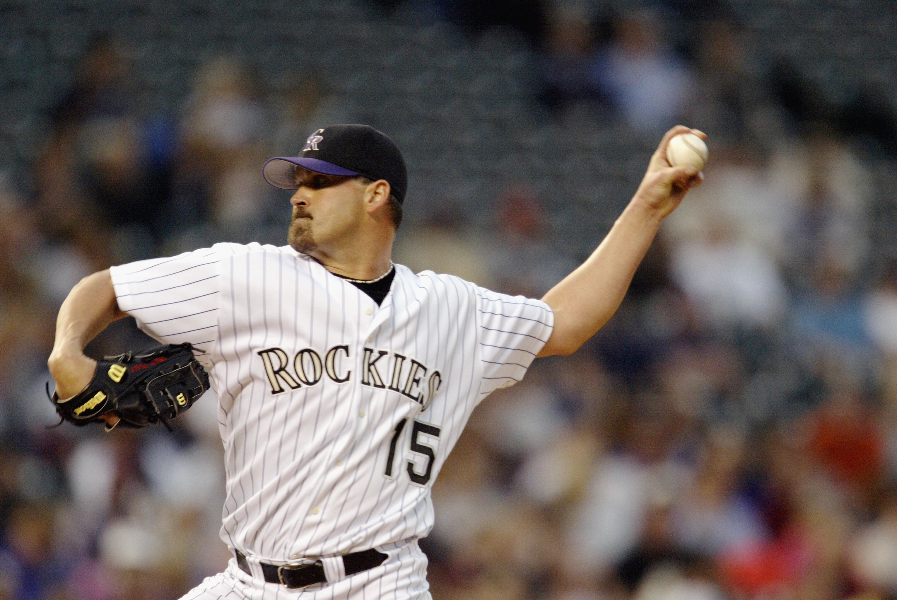DENVER - JUNE 17:  Starting pitcher Denny Neagle #15 of the Colorado Rockies delivers a pitch against the San Diego Padres in the second inning of the game at Coors Field on June 17, 2003 in Denver, Colorado.  The Padres won 4-3.  (Photo by Brian Bahr/Get