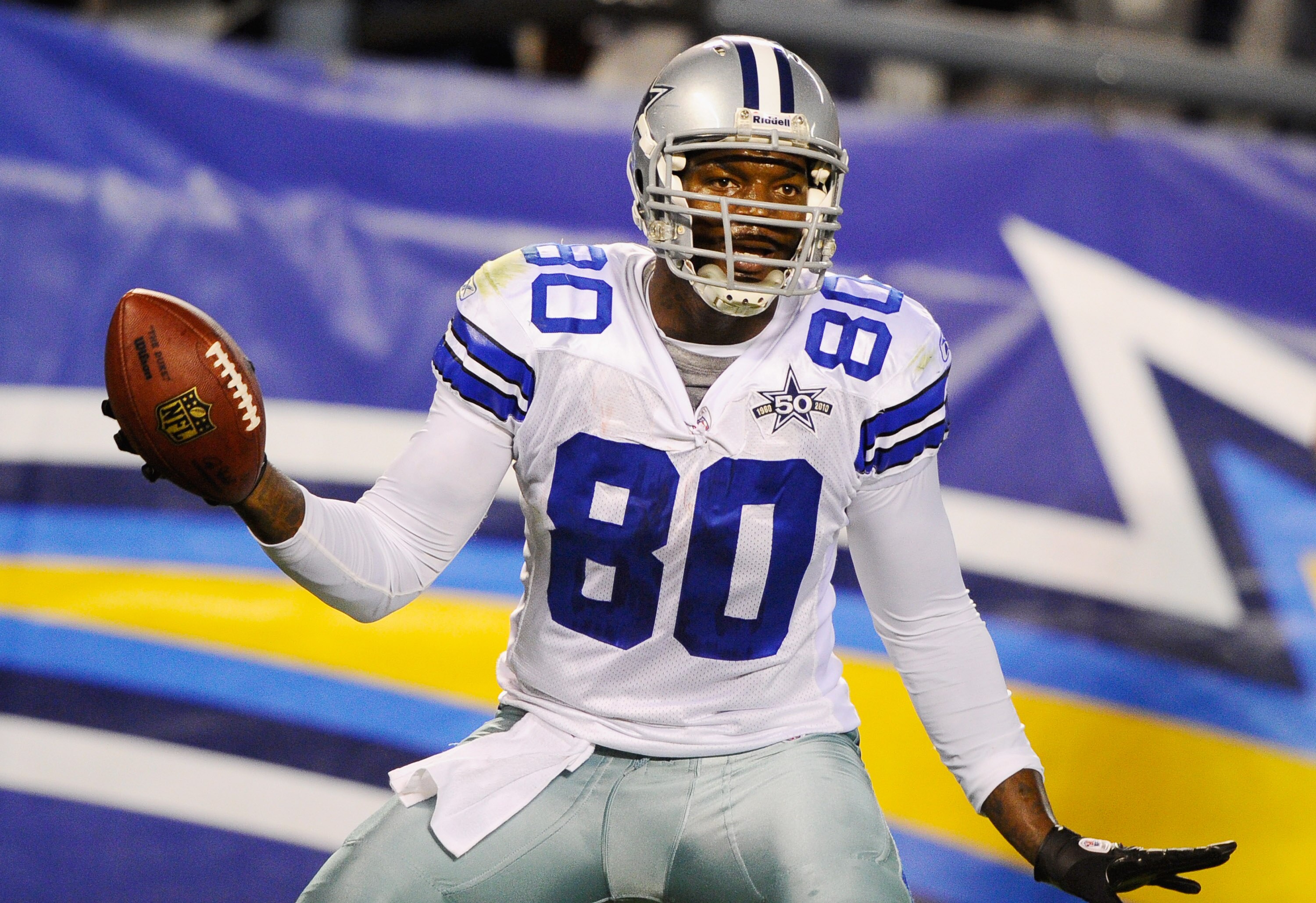 SAN DIEGO - AUGUST 21:  Tight end Martellus Bennett #80 of the Dallas Cowboys celebrates after scoring a touchdown against the San Diego Chargers during their pre-season NFL football game at Qualcomm Stadium on August 21, 2010 in San Diego, California.  (