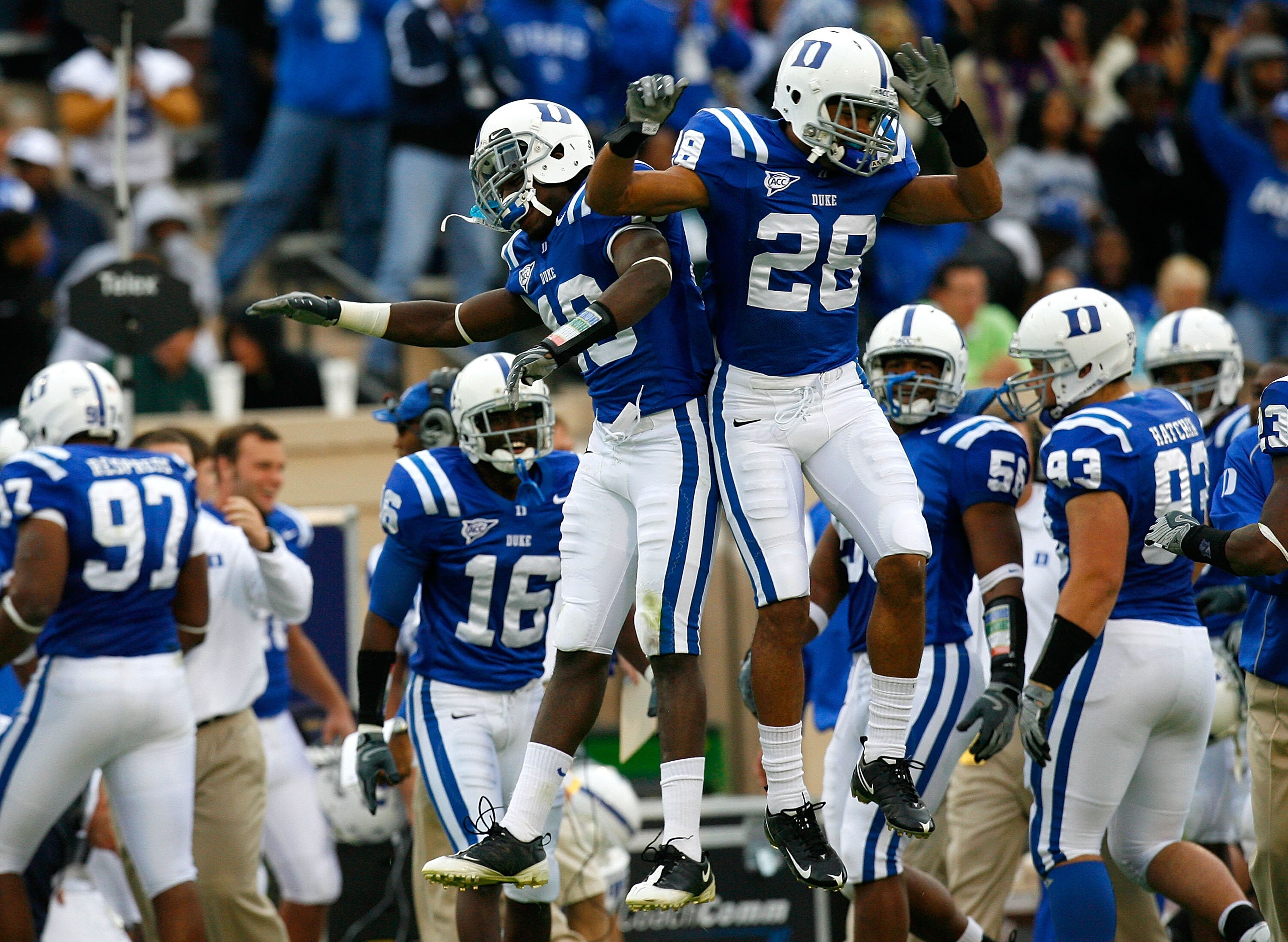 DURHAM, NC - OCTOBER 18:  Matt Daniels #40 celebrates with Adrian Aye-Darko #28 of the Duke Blue Devils after Aye-Darko's interception against the Miami Hurricanes during the game at Wallace Wade Stadium on October 18, 2008 in Durham, North Carolina.  (Ph