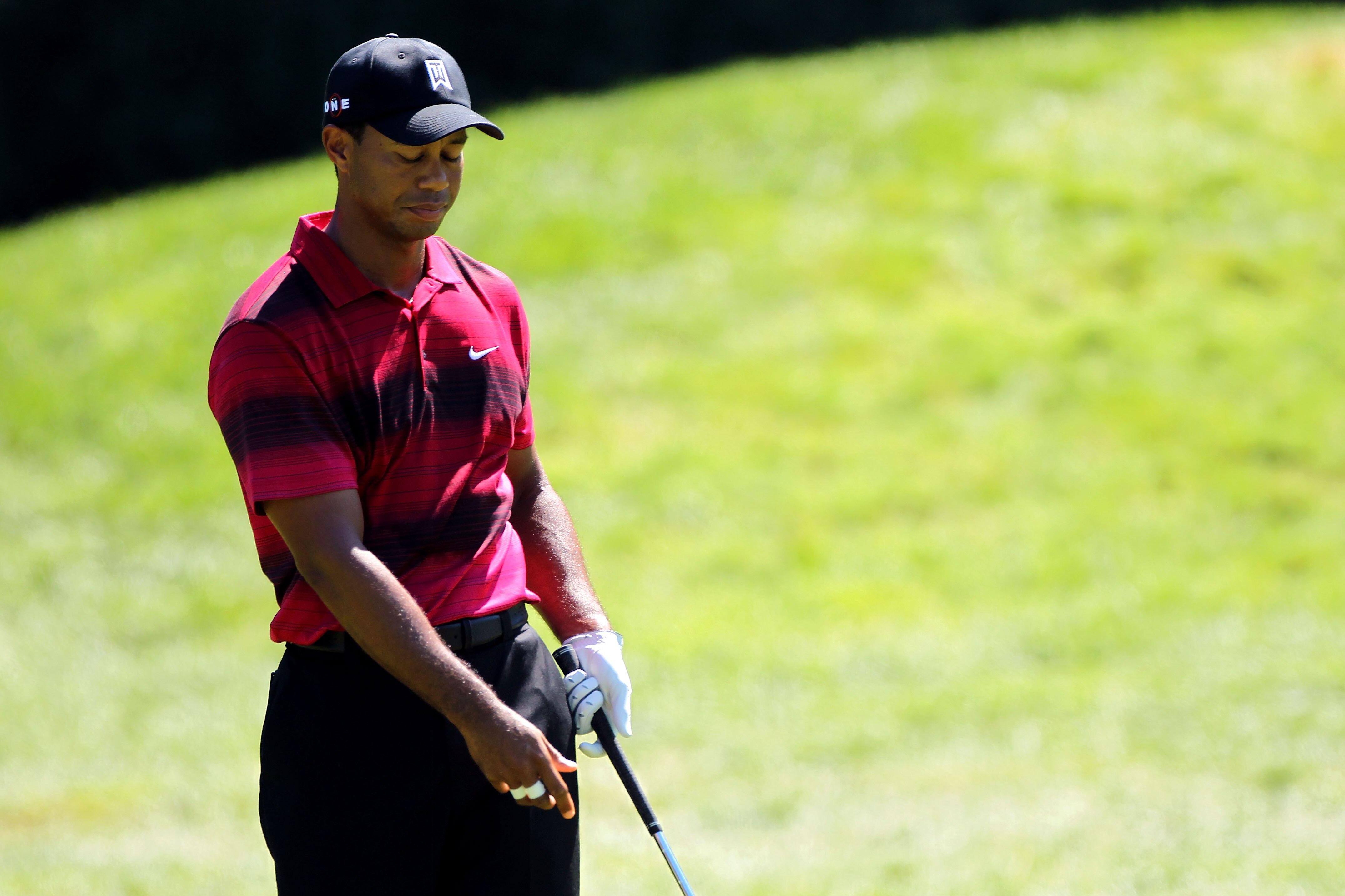 PARAMUS, NJ - AUGUST 29:  Tiger Woods reacts after he hit a shot from the fairway on the third hole during the final round of The Barclays at the Ridgewood Country Club on August 29, 2010 in Paramus, New Jersey.  (Photo by Hunter Martin/Getty Images)