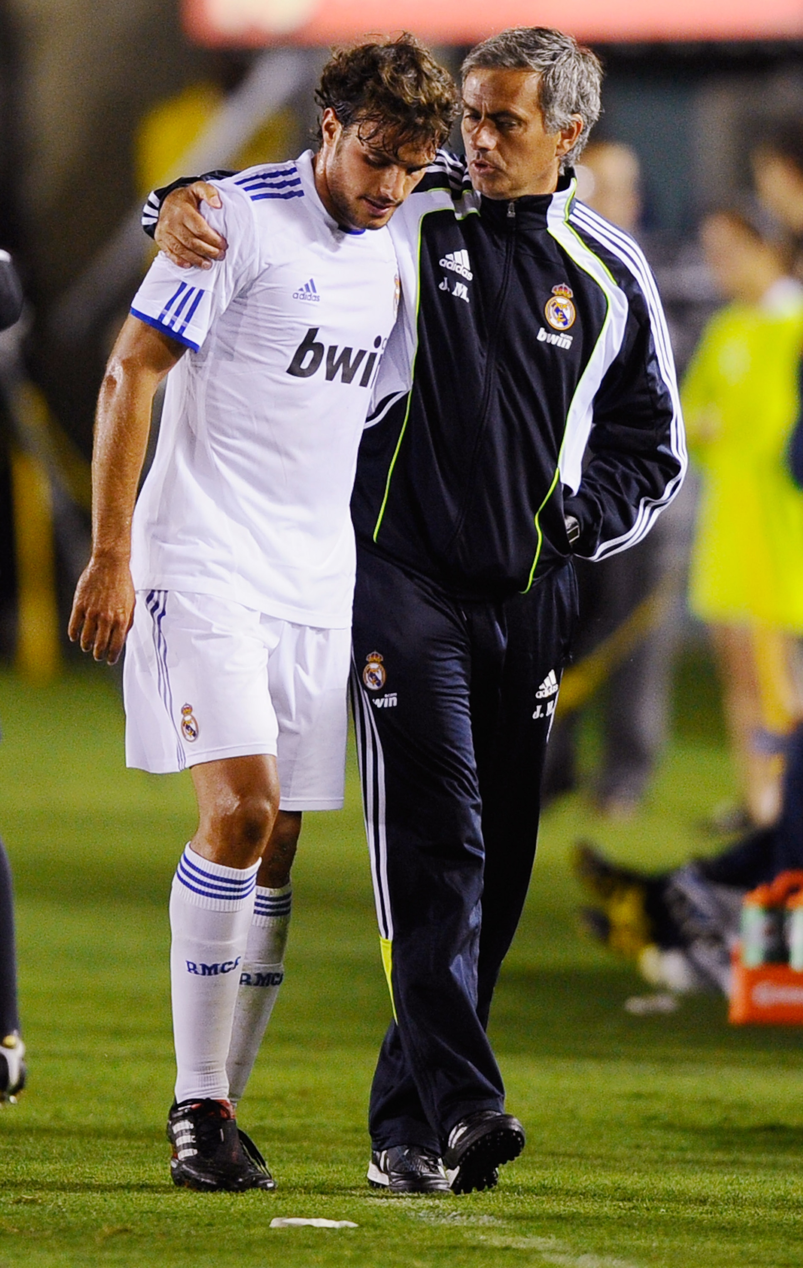 PASADENA, CA - AUGUST 07: Pedro Leon of Real Madrid with coach Jose Mourinho  during their pre-season friendly soccer match against Los Angeles Galaxy on August 7, 2010 at the Rose Bowl in Pasadena, California. Real Madrid will travel back to Spain after 