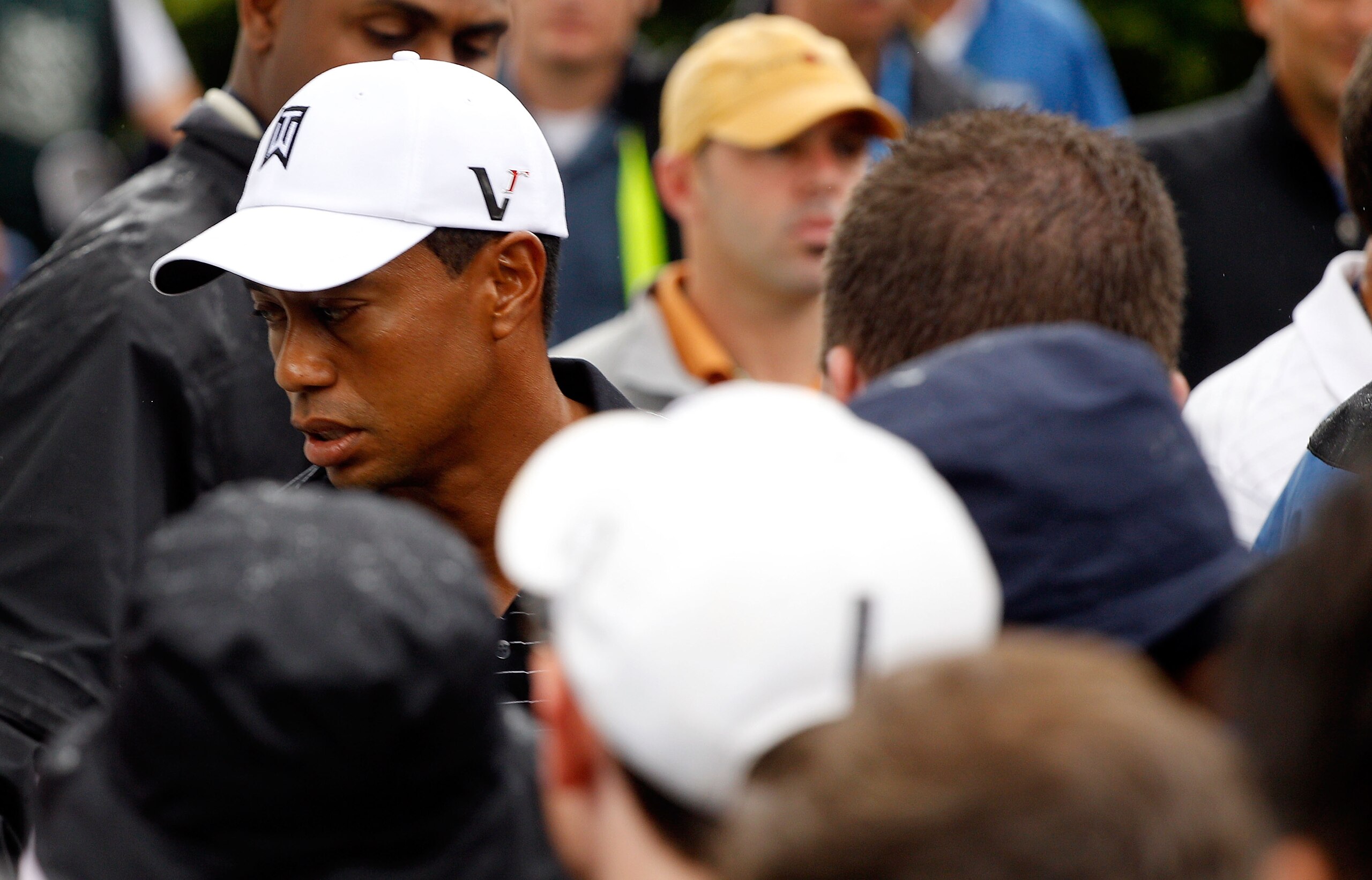PARAMUS, NJ - AUGUST 25: Tiger Woods walks past the media on the way to a press conference after the pro-am, prior to the start of The Barclays at the Ridgewood Country Club on August 25, 2010 in Paramus, New Jersey. (Photo by Scott Halleran/Getty Image PARAMUS, NJ - AUGUST 25: Tiger Woods walks past the media on the way to a press conference after the pro-am, prior to the start of The Barclays at the Ridgewood Country Club on August 25, 2010 in Paramus, New Jersey. (Photo by Scott Halleran/Getty Image