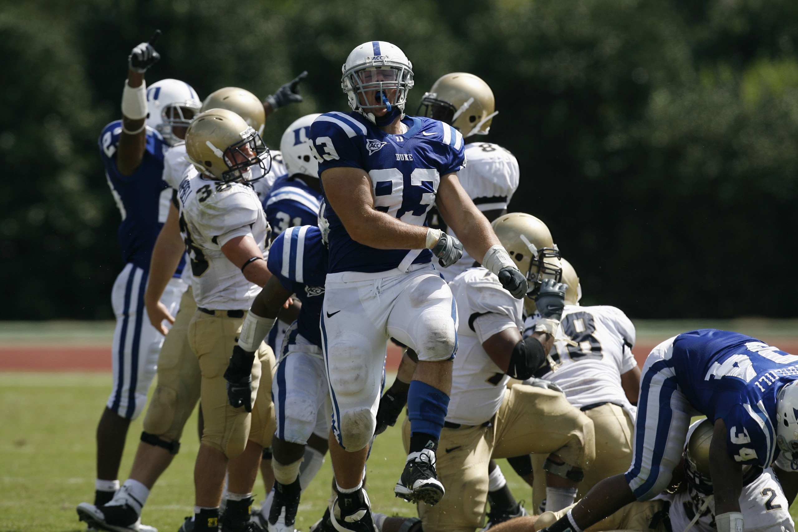 DURHAM, NC - SEPTEMBER 13:  Charlie Hatcher #93 of the Duke Blue Devils celebrates against the Navy Midshipmen during the game at Wallace Wade Stadium on September 13, 2008 in Durham, North Carolina.  (Photo by Kevin C. Cox/Getty Images)