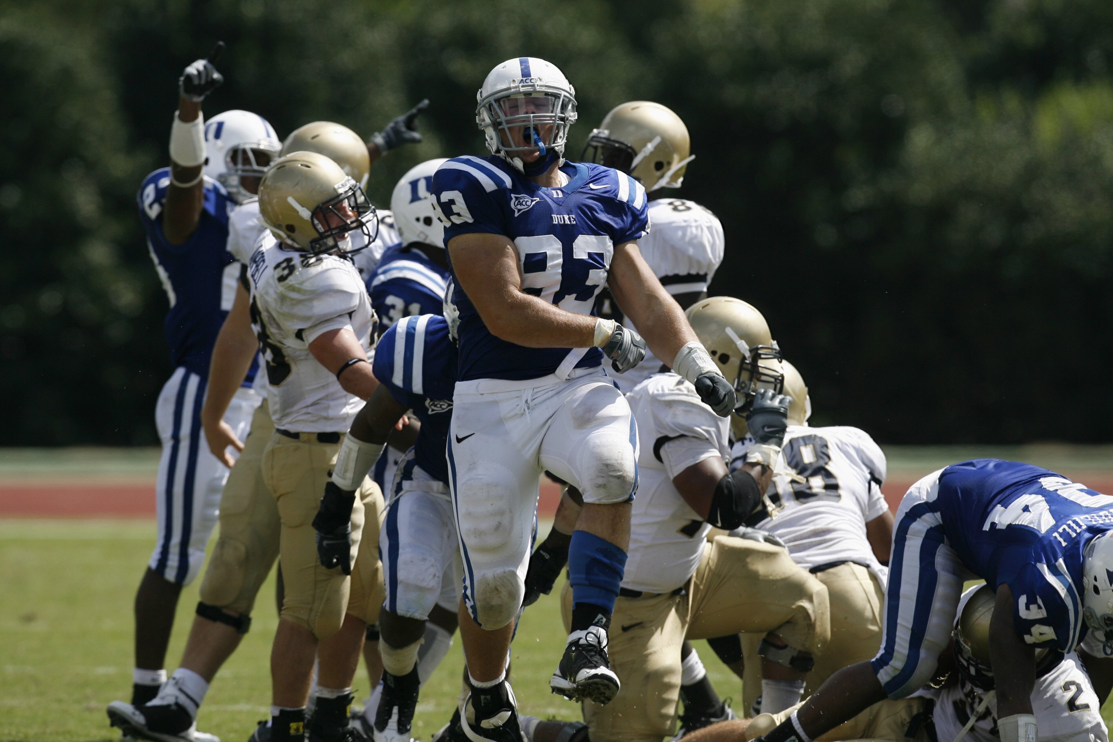 DURHAM, NC - SEPTEMBER 13: Charlie Hatcher #93 of the Duke Blue Devils celebrates against the Navy Midshipmen during the game at Wallace Wade Stadium on September 13, 2008 in Durham, North Carolina. (Photo by Kevin C. Cox/Getty Images) DURHAM, NC - SEPTEMBER 13: Charlie Hatcher #93 of the Duke Blue Devils celebrates against the Navy Midshipmen during the game at Wallace Wade Stadium on September 13, 2008 in Durham, North Carolina. (Photo by Kevin C. Cox/Getty Images)