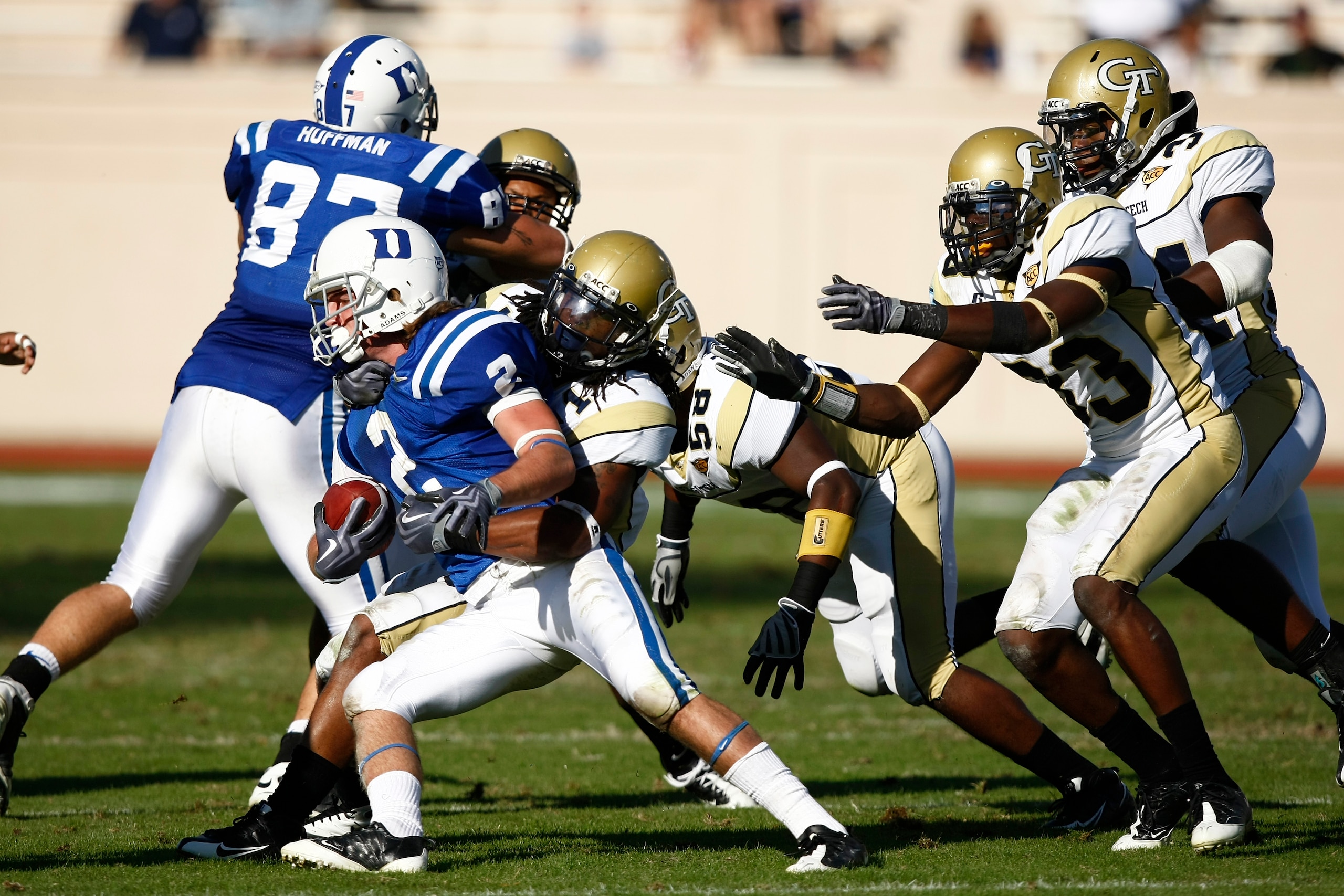 DURHAM, NC - NOVEMBER 14:  Morgan Burnett #1 and a group of Georgia Tech Yellow Jackets defenders tackle Conner Vernon #2 of the Duke Blue Devils at Wallace Wade Stadium on November 14, 2009 in Durham, North Carolina. (Photo by Joe Robbins/Getty Images)