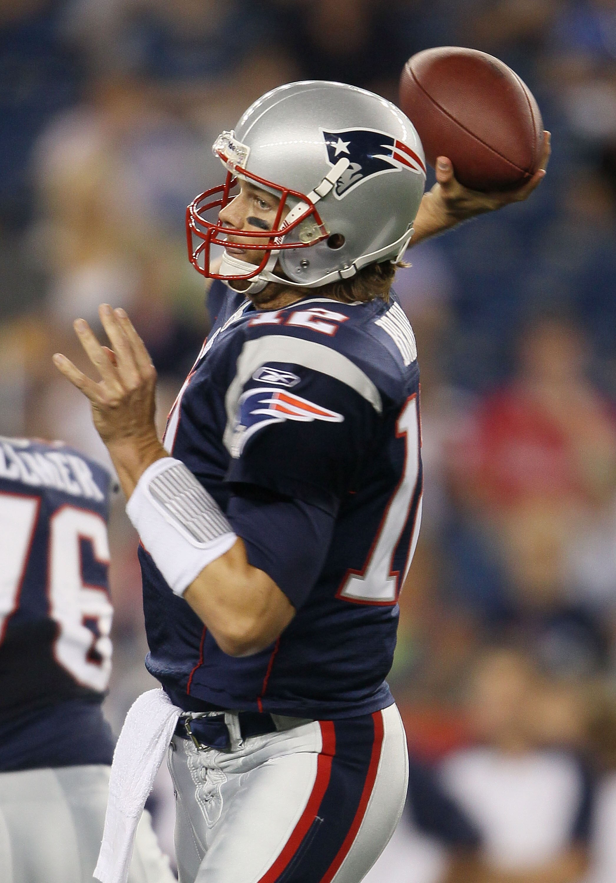 FOXBORO, MA - AUGUST 26:  Tom Brady #12 of the New England Patriots passes the ball in the first half against the St. Louis Rams on August 26, 2010 at Gillette Stadium in Foxboro, Massachusetts.  (Photo by Elsa/Getty Images)