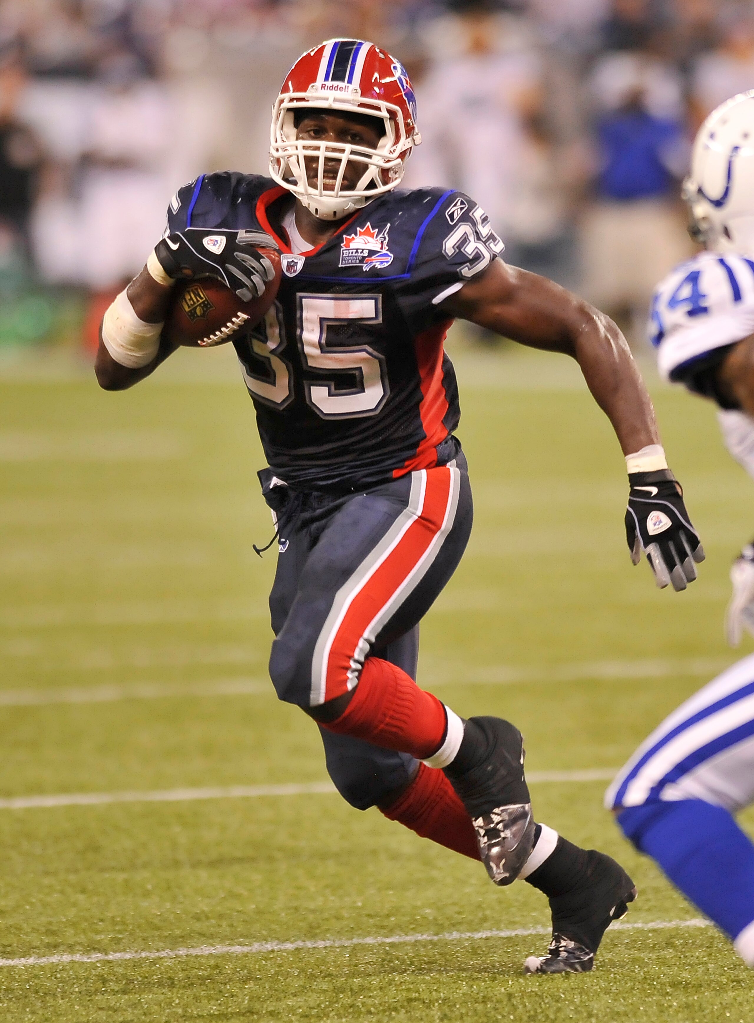 TORONTO, CANADA - AUGUST 19: Joique Bell #35 of the Buffalo Bills runs with the ball during game action against the Indianapolis Colts during game action August 19, 2010 at the Rogers Centre in Toronto, Ontario, Canada. (Photo by Brad White/Getty Images)