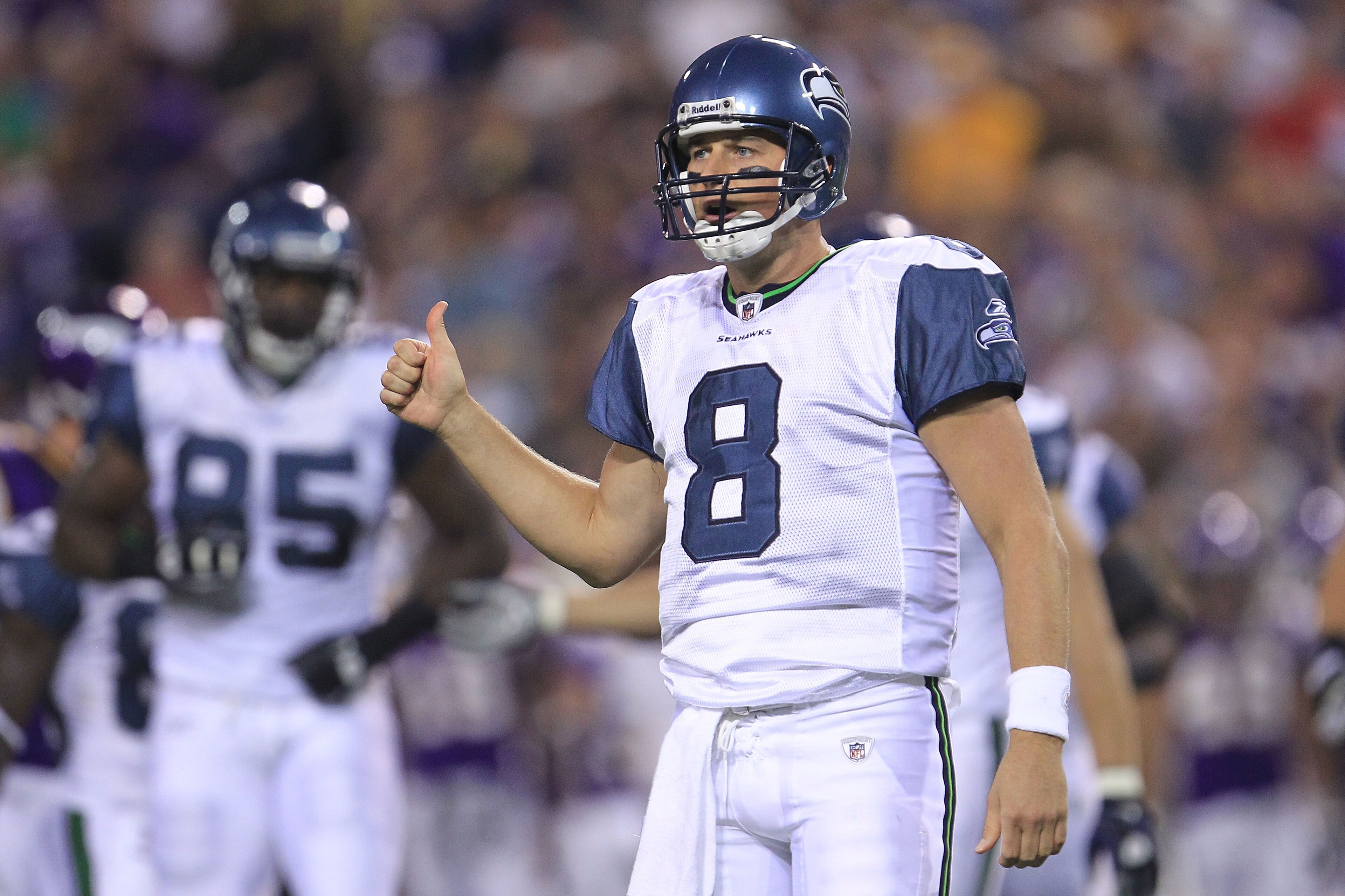 MINNEAPOLIS - AUGUST 28: Matt Hasselbeck #8 of the Seattle Seahawks asks for instructions against the Minnesota Vikings during a preseason NFL game at Mall of America Field at the Hubert H. Humphrey Metrodome on August 28, 2010  in Minneapolis, Minnesota.