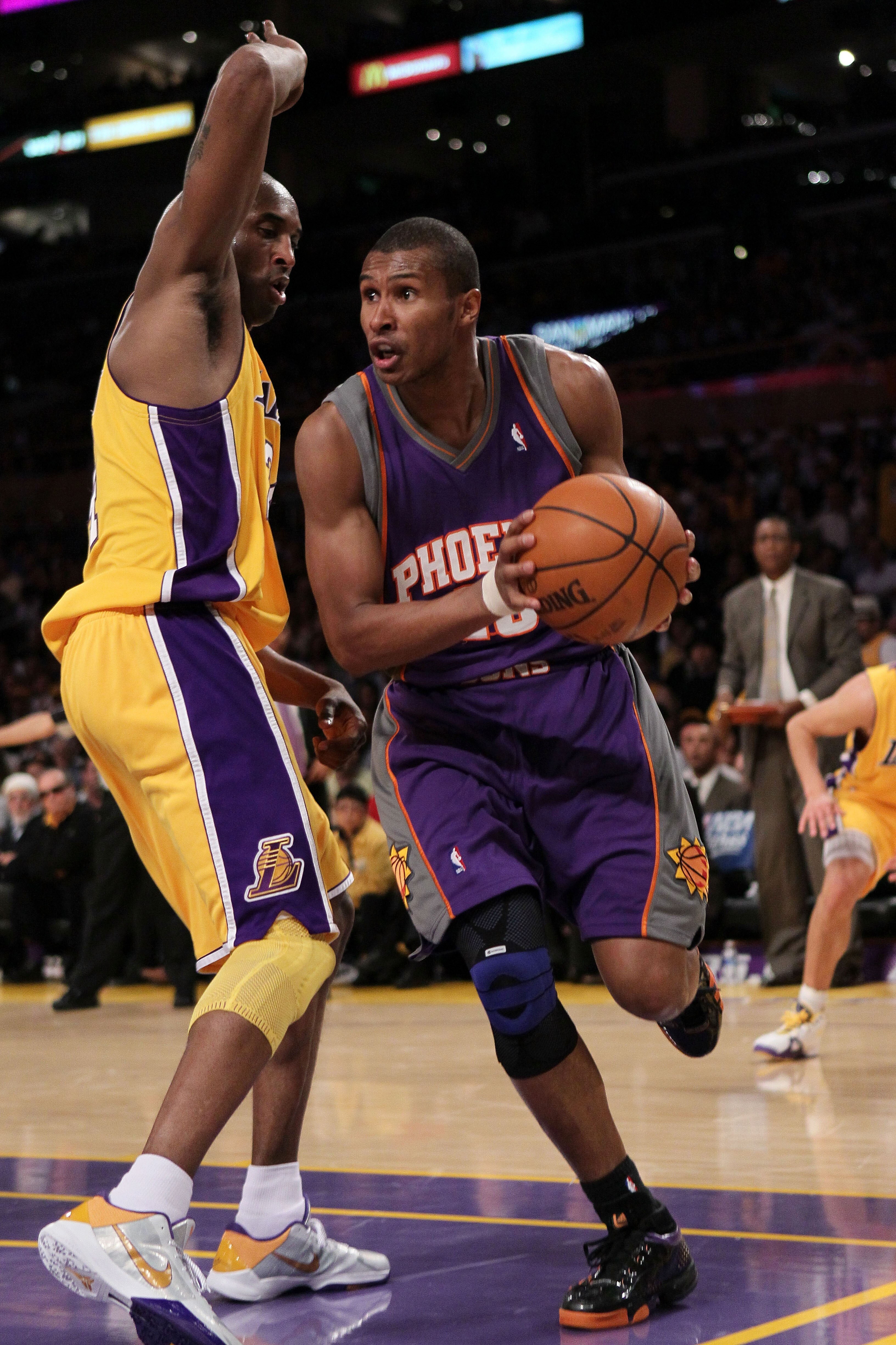 LOS ANGELES, CA - MAY 27:  Leandro Barbosa #10 of the Phoenix Suns drives with the ball on Kobe Bryant #24 of the Los Angeles Lakers in the second quarter of Game Five of the Western Conference Finals during the 2010 NBA Playoffs at Staples Center on May 