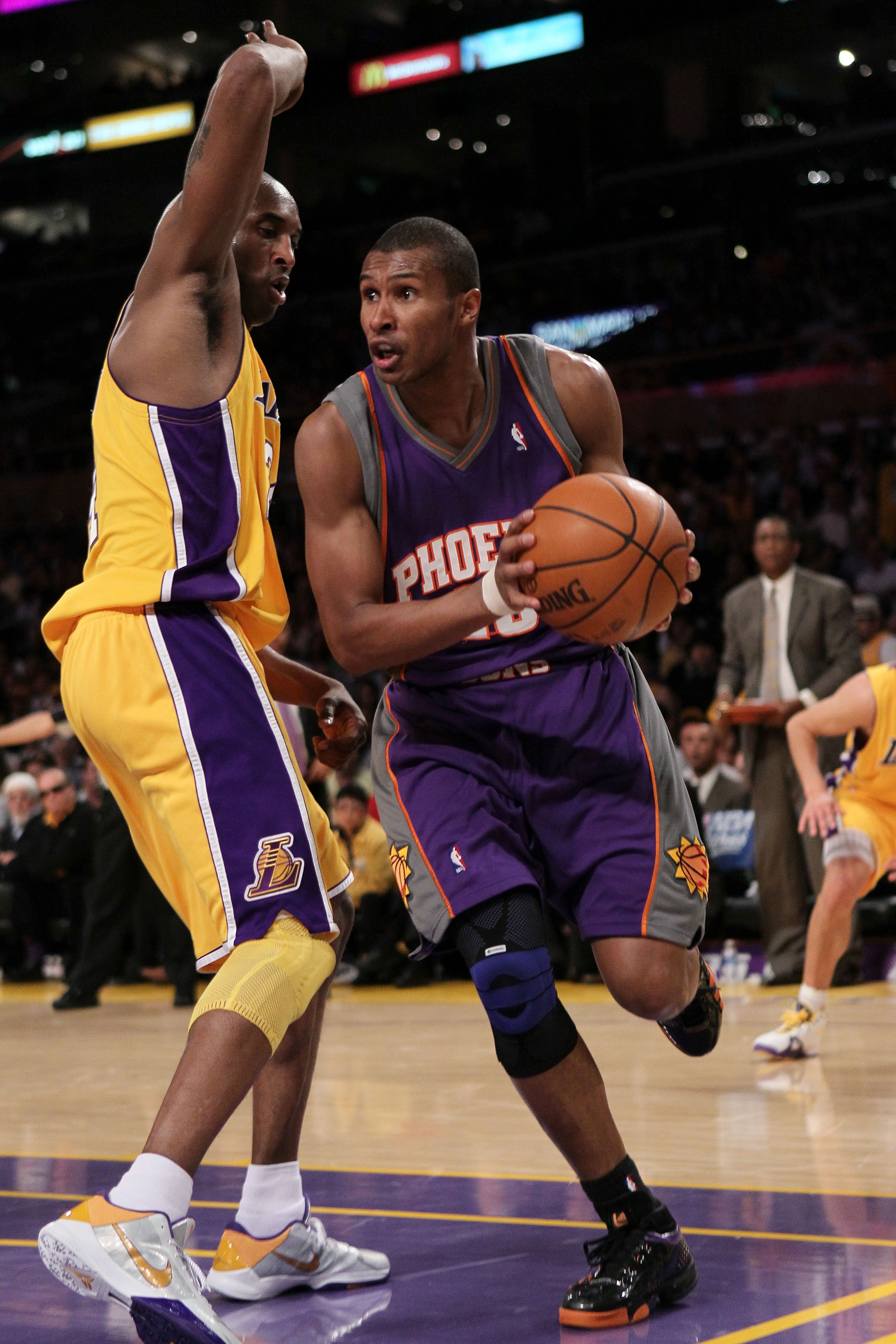 LOS ANGELES, CA - MAY 27:  Leandro Barbosa #10 of the Phoenix Suns drives with the ball on Kobe Bryant #24 of the Los Angeles Lakers in the second quarter of Game Five of the Western Conference Finals during the 2010 NBA Playoffs at Staples Center on May 