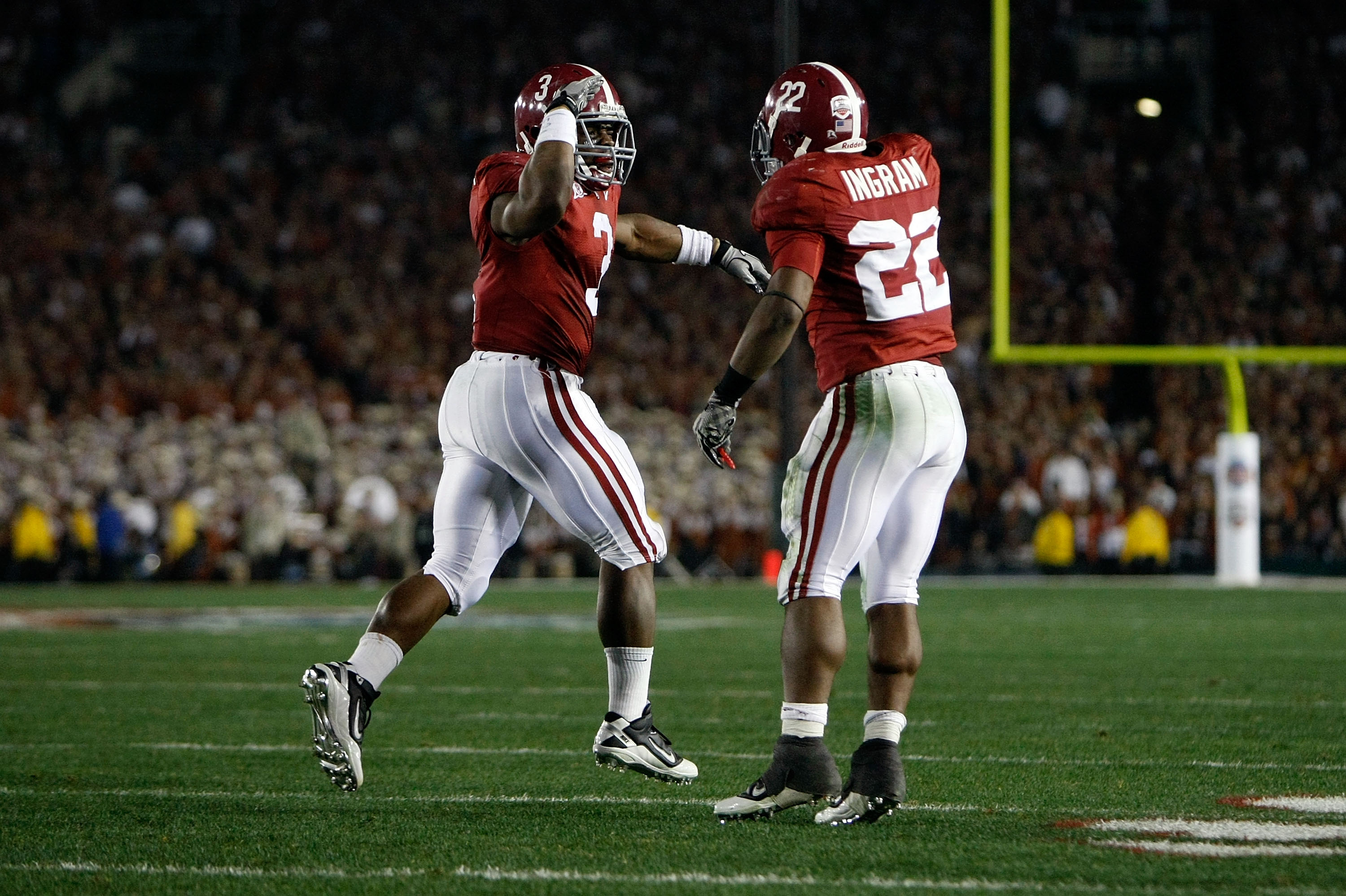 PASADENA, CA - JANUARY 07:  Running back Trent Richardson #3 of the Alabama Crimson Tide celebrates with Mark Ingram #22 after Richardson  runs for a 49-yard touchdown against the Texas Longhorns in the second quarter of the Citi BCS National Championship