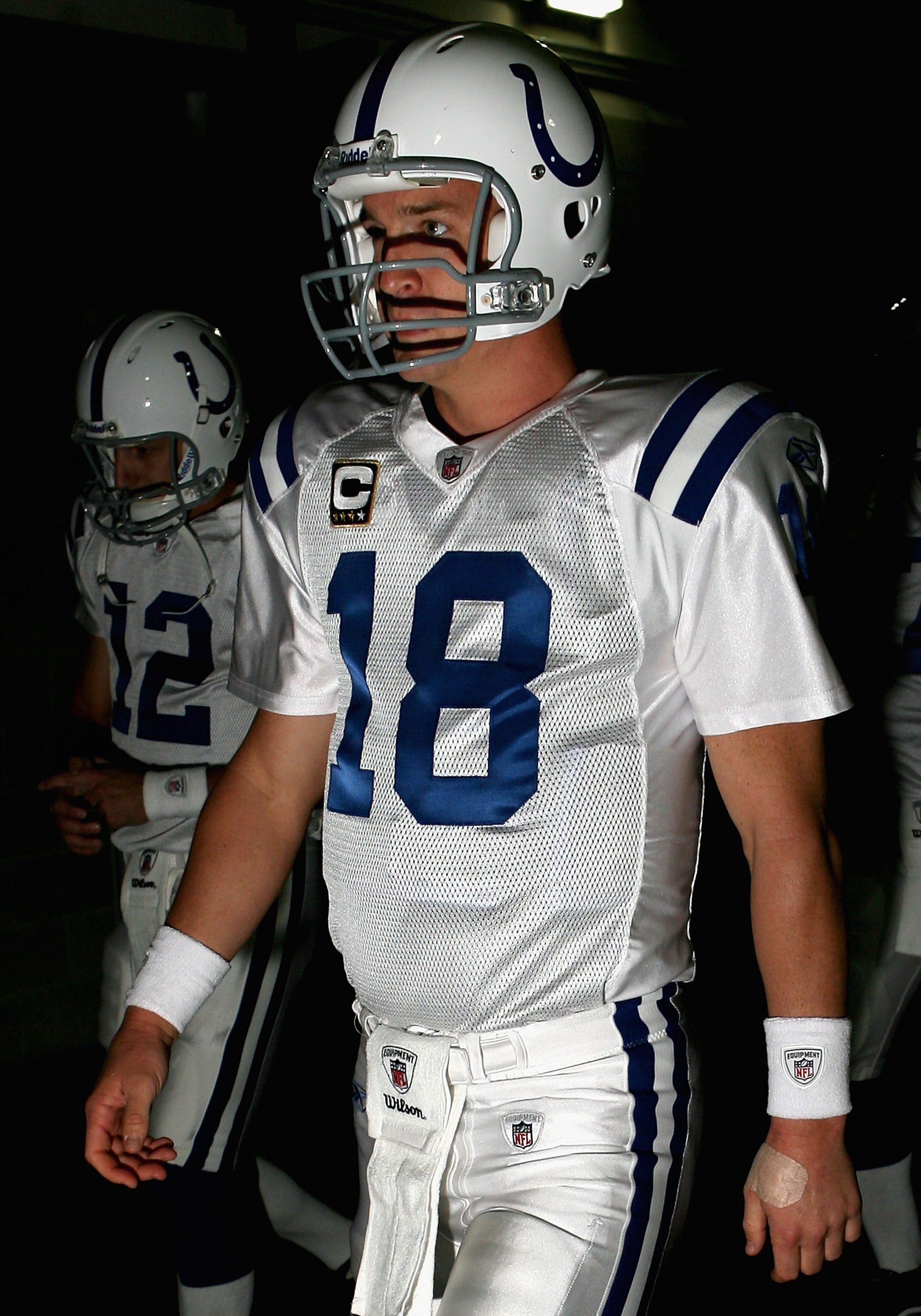 GLENDALE, AZ - SEPTEMBER 27:  Quarterback Peyton Manning #18 of the Indianapolis Colts walks out to the field before the NFL game against the Arizona Cardinals at the Universtity of Phoenix Stadium on September 27, 2009 in Glendale, Arizona.  The Colts de