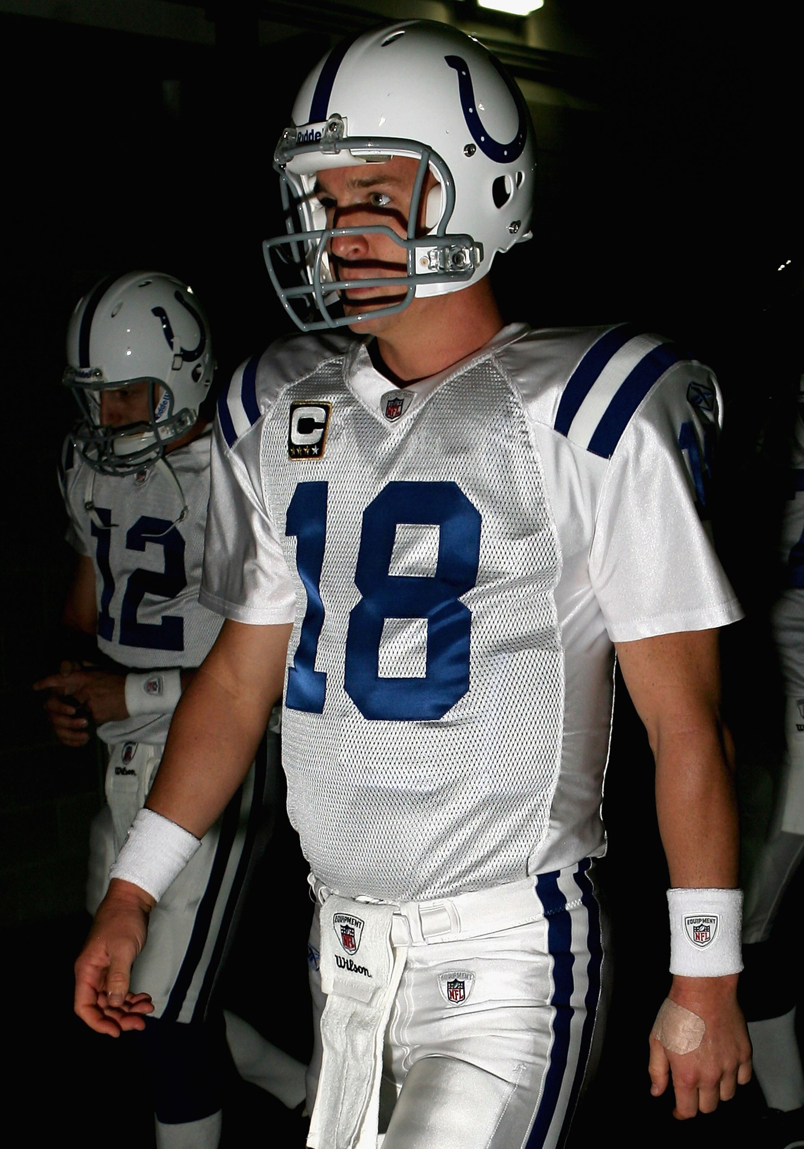 GLENDALE, AZ - SEPTEMBER 27:  Quarterback Peyton Manning #18 of the Indianapolis Colts walks out to the field before the NFL game against the Arizona Cardinals at the Universtity of Phoenix Stadium on September 27, 2009 in Glendale, Arizona.  The Colts de