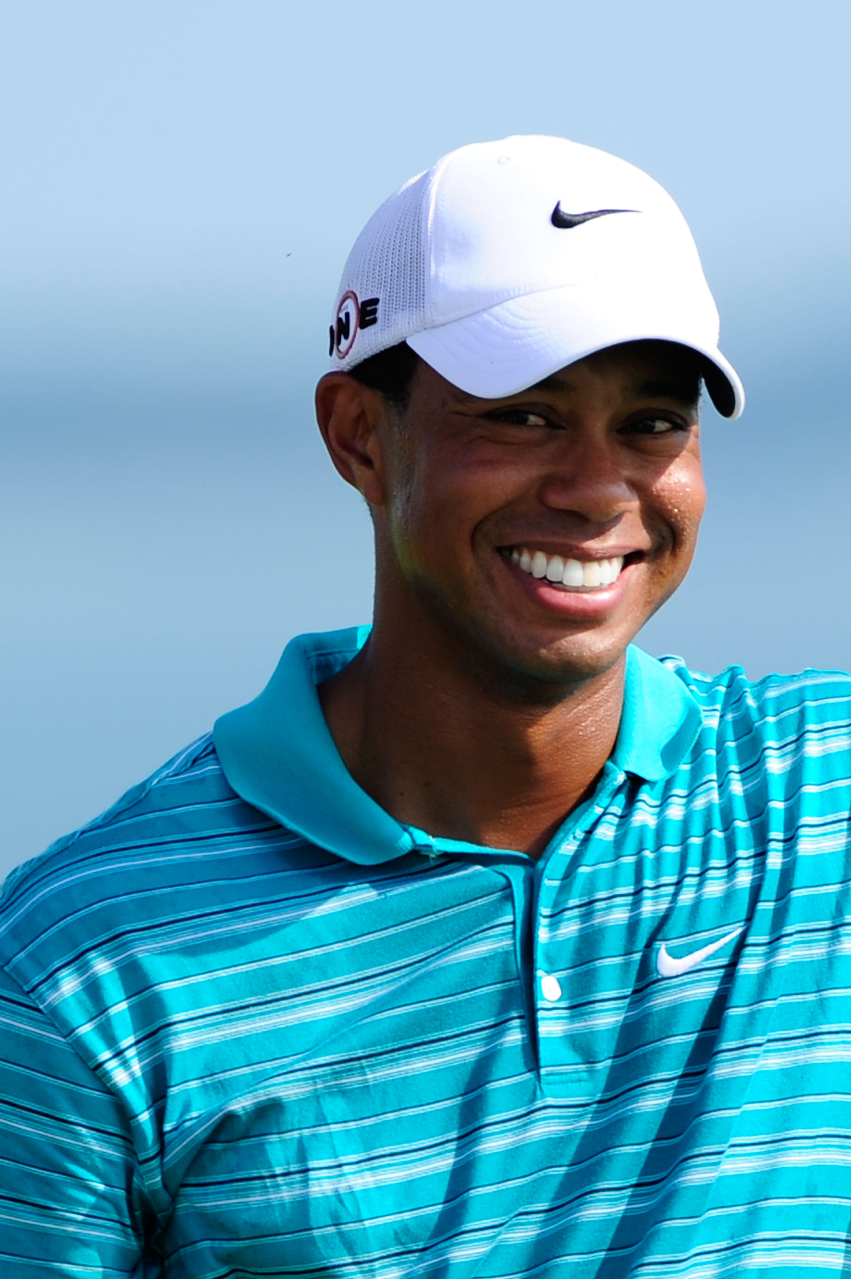 KOHLER, WI - AUGUST 14:  Tiger Woods smiles on the 15th tee during the continuation of the second round of the 92nd PGA Championship on the Straits Course at Whistling Straits on August 14, 2010 in Kohler, Wisconsin.  (Photo by Stuart Franklin/Getty Image