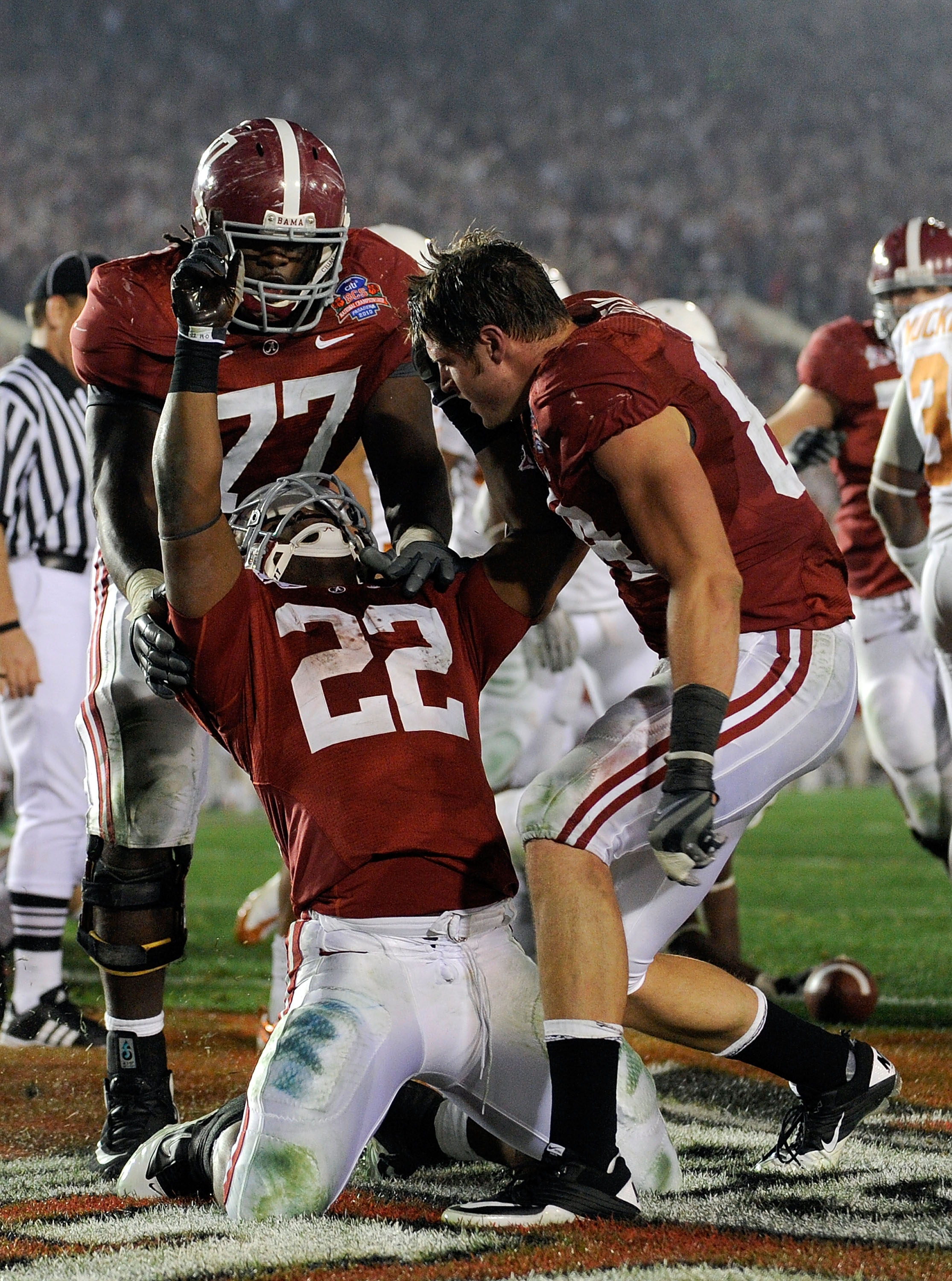 PASADENA, CA - JANUARY 07:  Running back Mark Ingram #22 of the Alabama Crimson Tide celebrates with teammates after scoring in the fourth quarter against the Texas Longhorns during the Citi BCS National Championship game at the Rose Bowl on January 7, 20