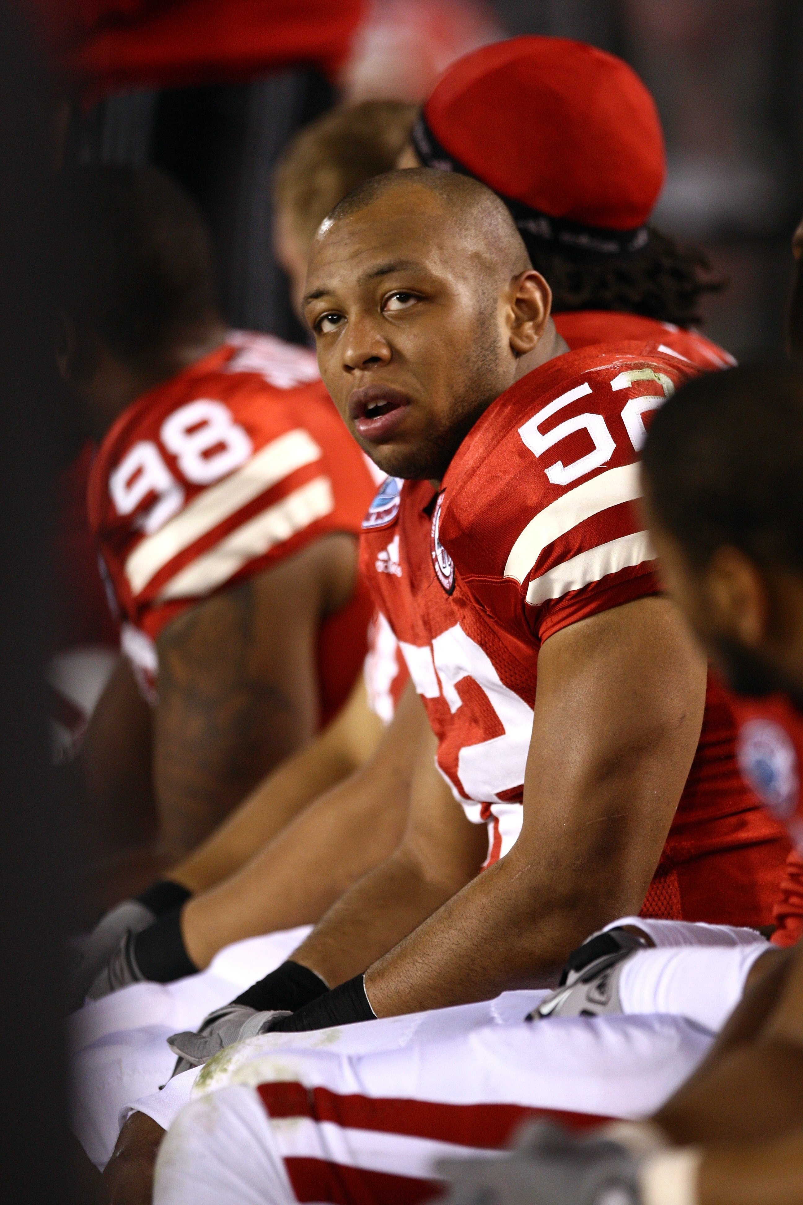SAN DIEGO - DECEMBER 30:  Phillip Dillard #52 of the University of Nebraska Cornhuskers looks on from the bench during the Pacific Life Holiday Bowl against University of Arizona Wildcats on December 30, 2009 at Qualcomm Stadium in San Diego, California.