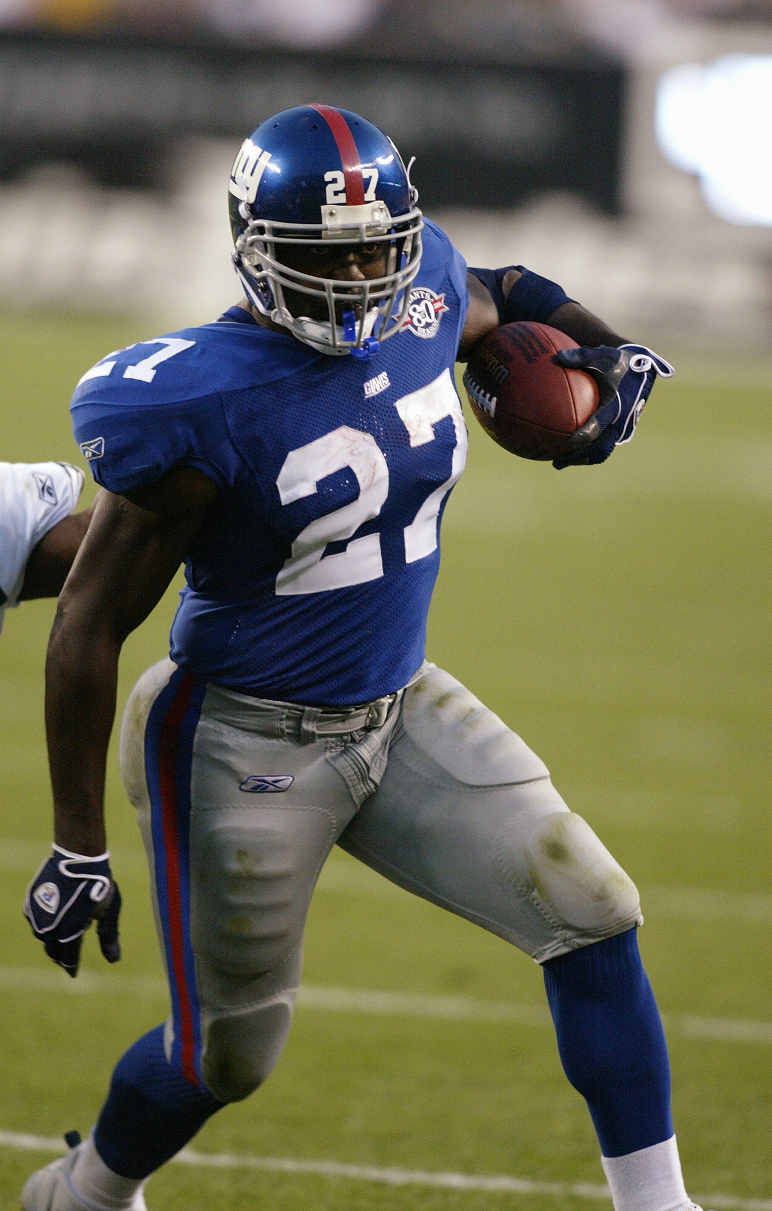 PHILADELPHIA - SEPTEMBER 12:  Ron Dayne of the New York Giants carries the ball against the Philadelphia Eagles on September 12, 2004 at Lincoln Financial Field in Philadelphia, Pennsylvania.  The Eagles won 31-17.  (Photo by Streeter Lecka/Getty Images)