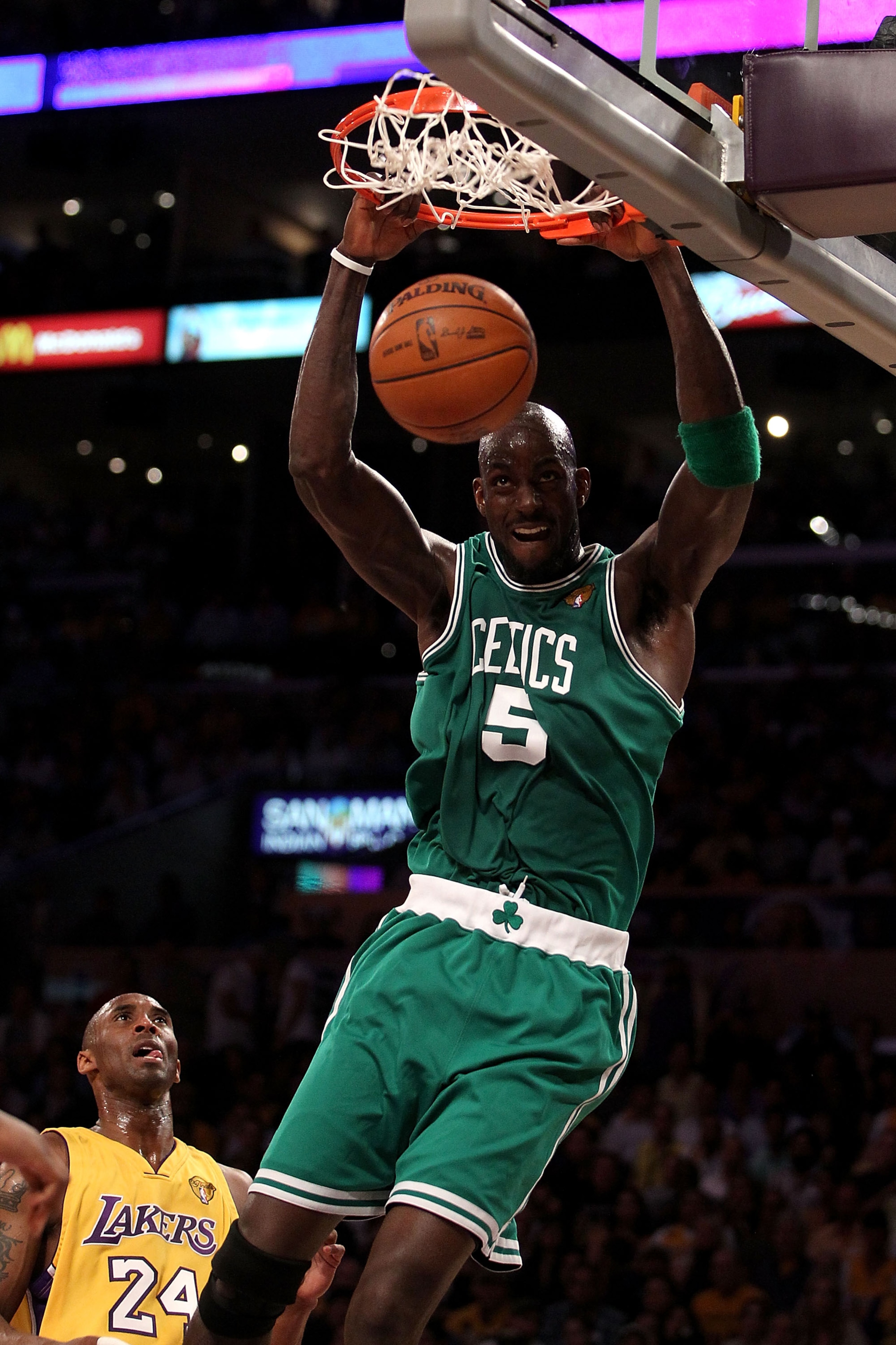 LOS ANGELES, CA - JUNE 17:  Kevin Garnett #5 of the Boston Celtics slam dunks over Kobe Bryant #24 of the Los Angeles Lakers in the first quarter of Game Seven of the 2010 NBA Finals at Staples Center on June 17, 2010 in Los Angeles, California.  NOTE TO