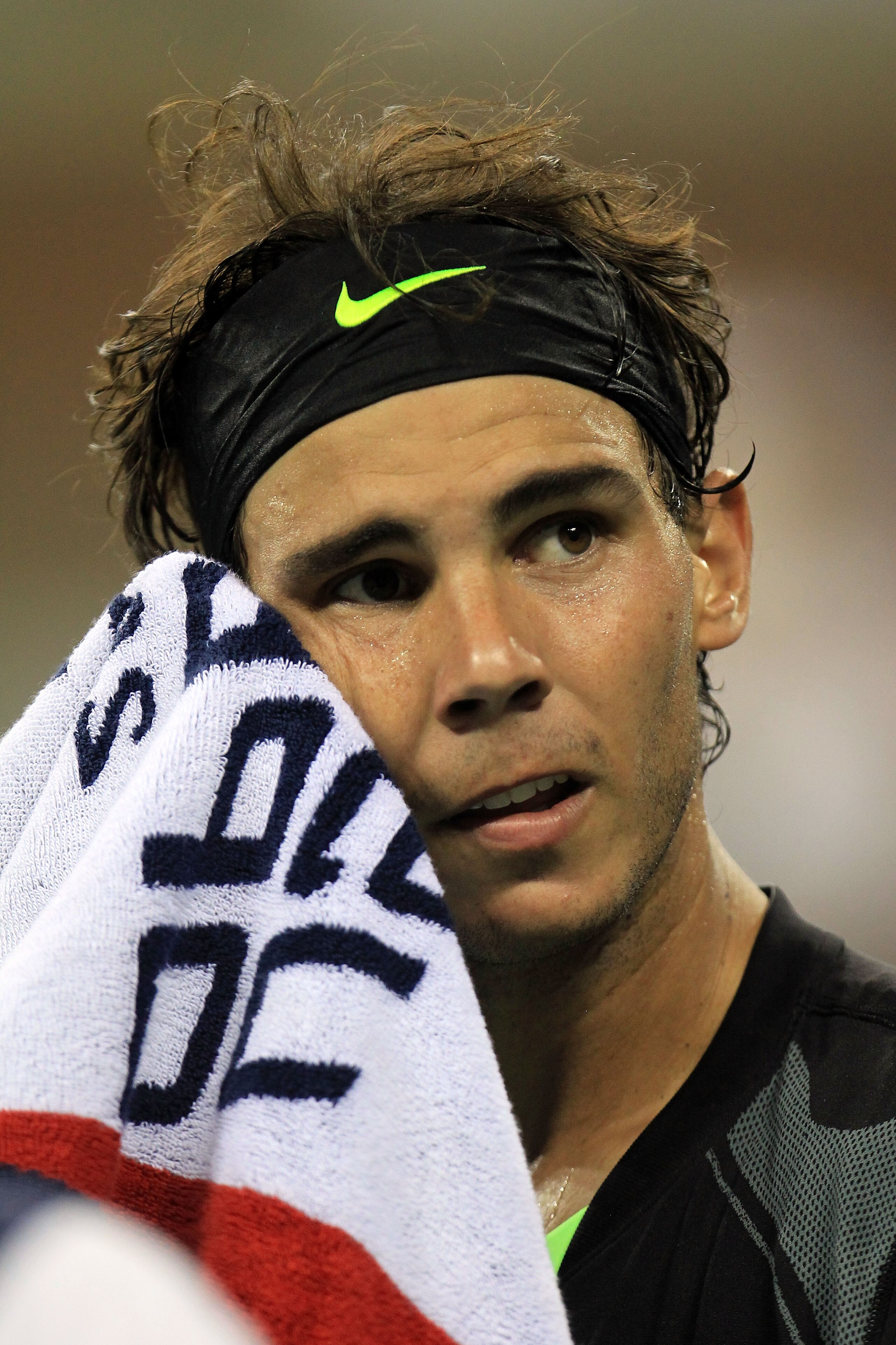 MELBOURNE, AUSTRALIA - JANUARY 26:  Rafael Nadal of Spain recieves medical attention between games in his quarterfinal match against Andy Murray of Great Britain during day nine of the 2010 Australian Open at Melbourne Park on January 26, 2010 in Melbourn