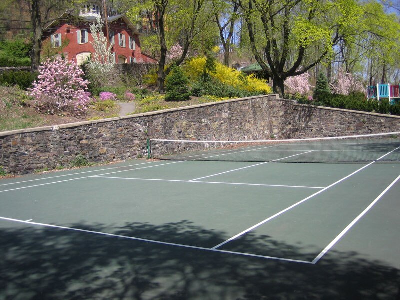 Tiger's courts will look just like this, but without the houses or happy playground nearby.