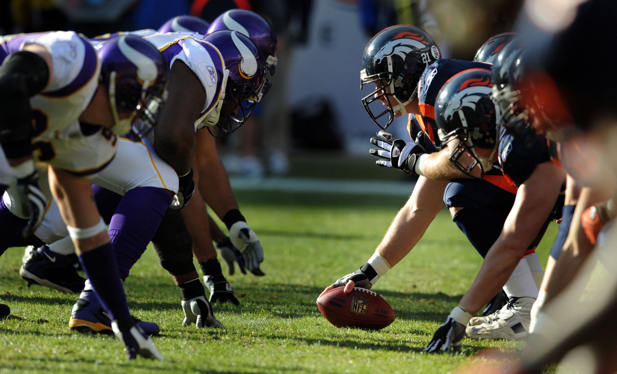DENVER - DECEMBER 30:  Center Chris Myers #62 of the Denver Broncos gets set to snap the ball during the football game against the Minnesota Vikings at Invesco Field at Mile High on December 30, 2007 in Denver, Colorado.  (Photo by Steve Dykes/Getty Image
