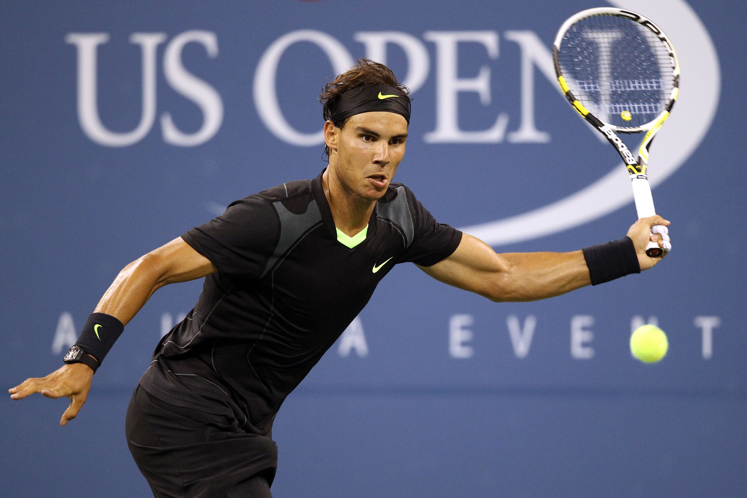 NEW YORK - AUGUST 31:  Rafael Nadal of Spain returns a shot against Teymuraz Gabashvili of Russia during his first round men's single's match on day two of the 2010 U.S. Open at the USTA Billie Jean King National Tennis Center on August 31, 2010 in the Fl