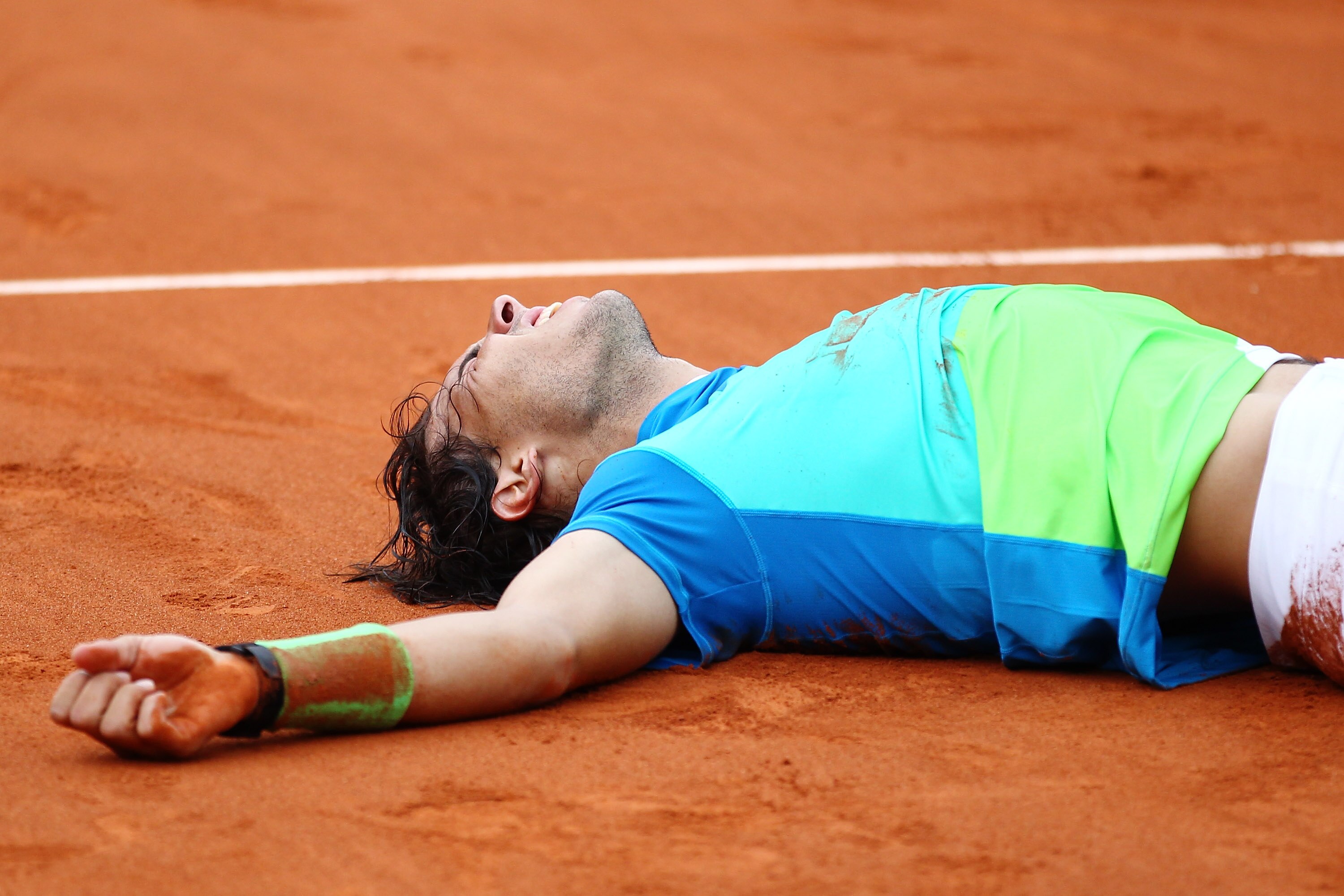 PARIS - JUNE 06: Rafael Nadal of Spain celebrates winning championship point during the men's singles final match between Rafael Nadal of Spain and Robin Soderling of Sweden on day fifteen of the French Open at Roland Garros on June 6, 2010 in Paris, Fra PARIS - JUNE 06: Rafael Nadal of Spain celebrates winning championship point during the men's singles final match between Rafael Nadal of Spain and Robin Soderling of Sweden on day fifteen of the French Open at Roland Garros on June 6, 2010 in Paris, Fra