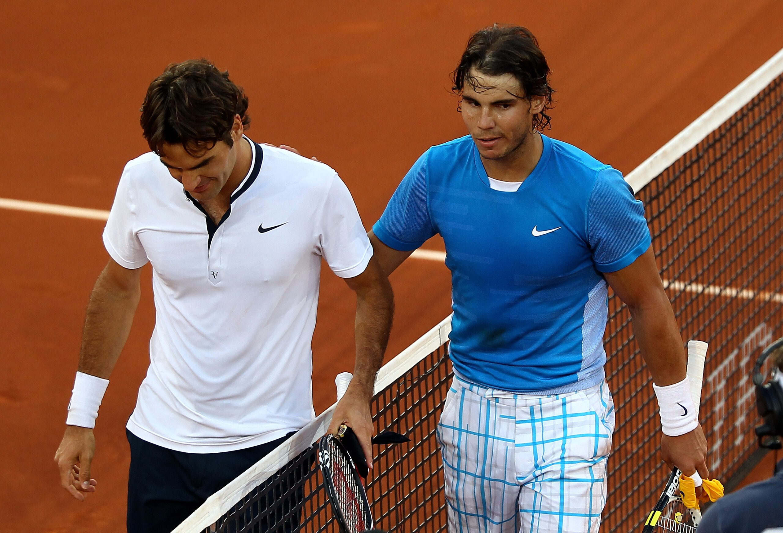 MADRID, SPAIN - MAY 16:  Rafael Nadal of Spain at the net after his straight sets victory against Roger Federer of Switzerland in the mens final match during the Mutua Madrilena Madrid Open tennis tournament at the Caja Magica on May 16, 2010 in Madrid, S